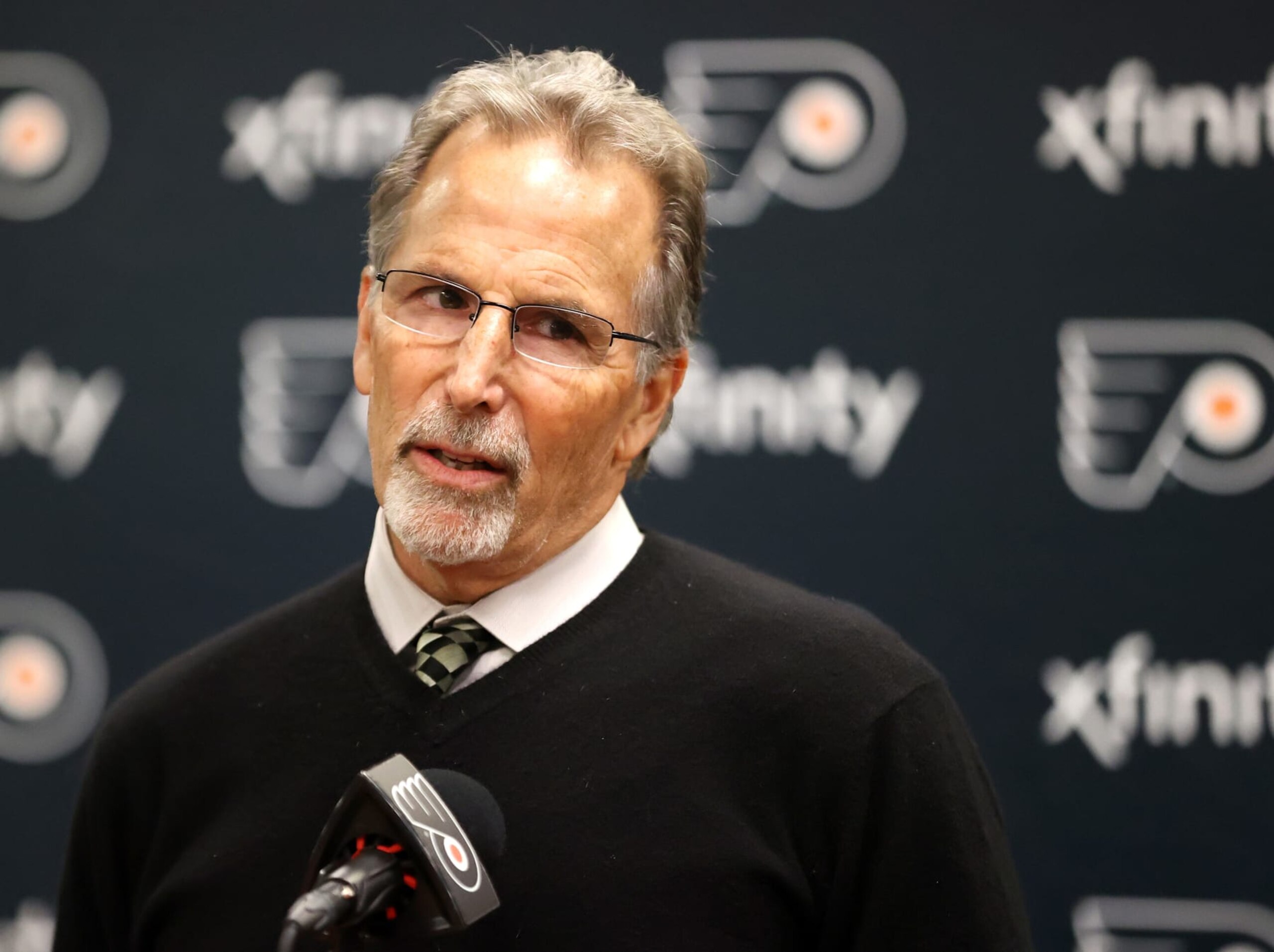 PHILADELPHIA, PENNSYLVANIA - OCTOBER 23: Head Coach of the Philadelphia Flyers John Tortorella speaks during a press conference after being defeated 3-0 by the San Jose Sharks at the Wells Fargo Center on October 23, 2022 in Philadelphia, Pennsylvania. (Photo by Len Redkoles/NHLI via Getty Images) PHILADELPHIA, PENNSYLVANIA - OCTOBER 23: Head Coach of the Philadelphia Flyers John Tortorella speaks during a press conference after being defeated 3-0 by the San Jose Sharks at the Wells Fargo Center on October 23, 2022 in Philadelphia, Pennsylvania. (Photo by Len Redkoles/NHLI via Getty Images)