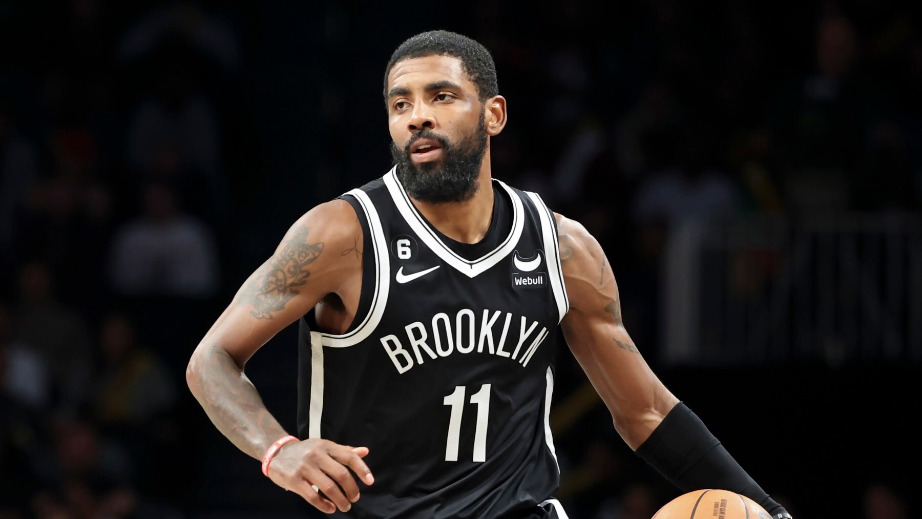 Brooklyn Nets guard Kyrie Irving (11) dribbles against the Chicago Bulls during the second half of an NBA basketball game Tuesday, Nov. 1, 2022, in New York. (AP Photo/Jessie Alcheh)