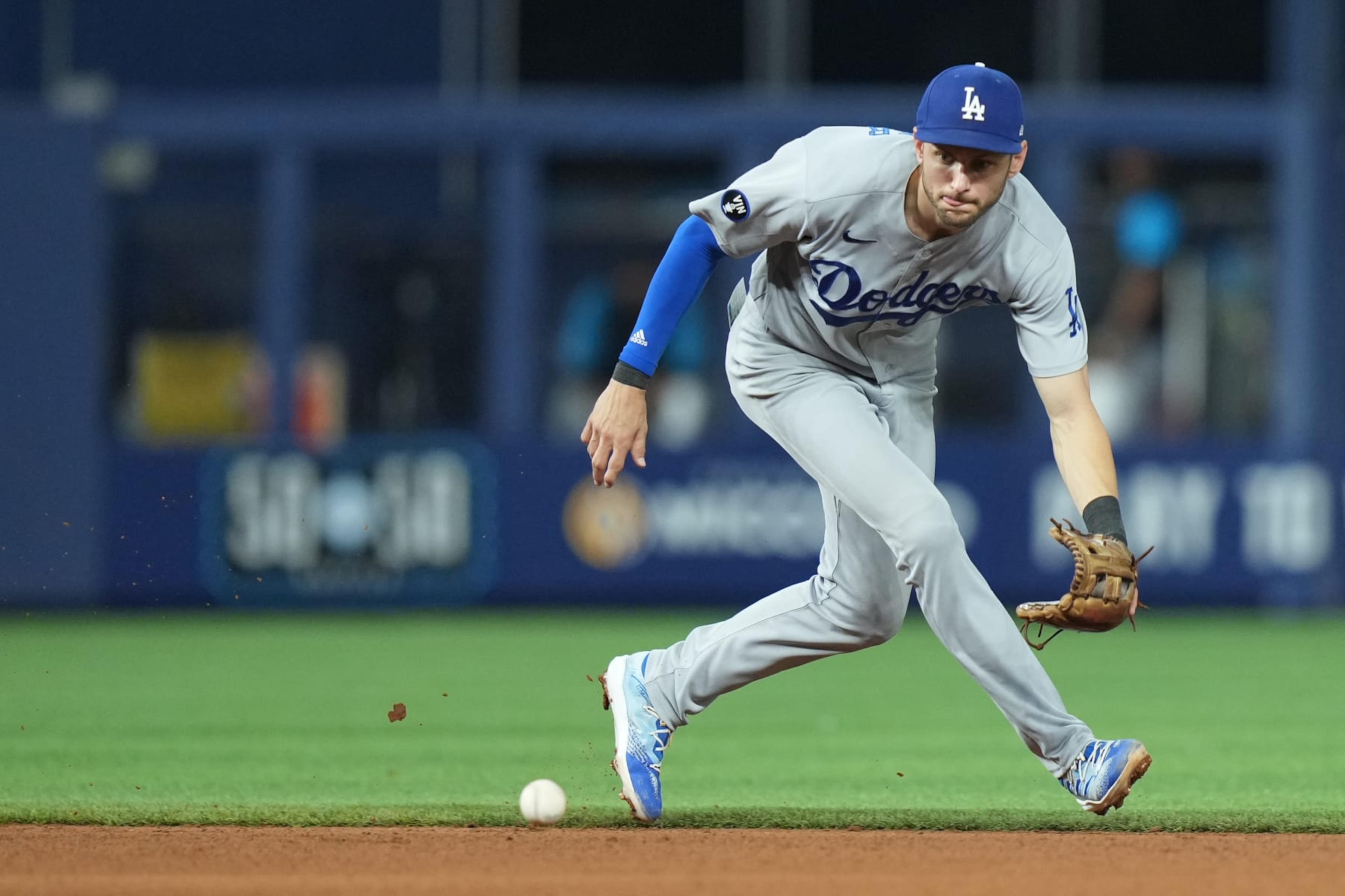 MIAMI, FL - AUGUST 29: Los Angeles Dodgers shortstop Trea Turner (6) fields a grounder to short during the game between the Los Angeles Dodgers and the Miami Marlins on Friday, August 29, 2022 at LoanDepot Park in Miami, FL (Photo by Peter Joneleit/Icon Sportswire via Getty Images)