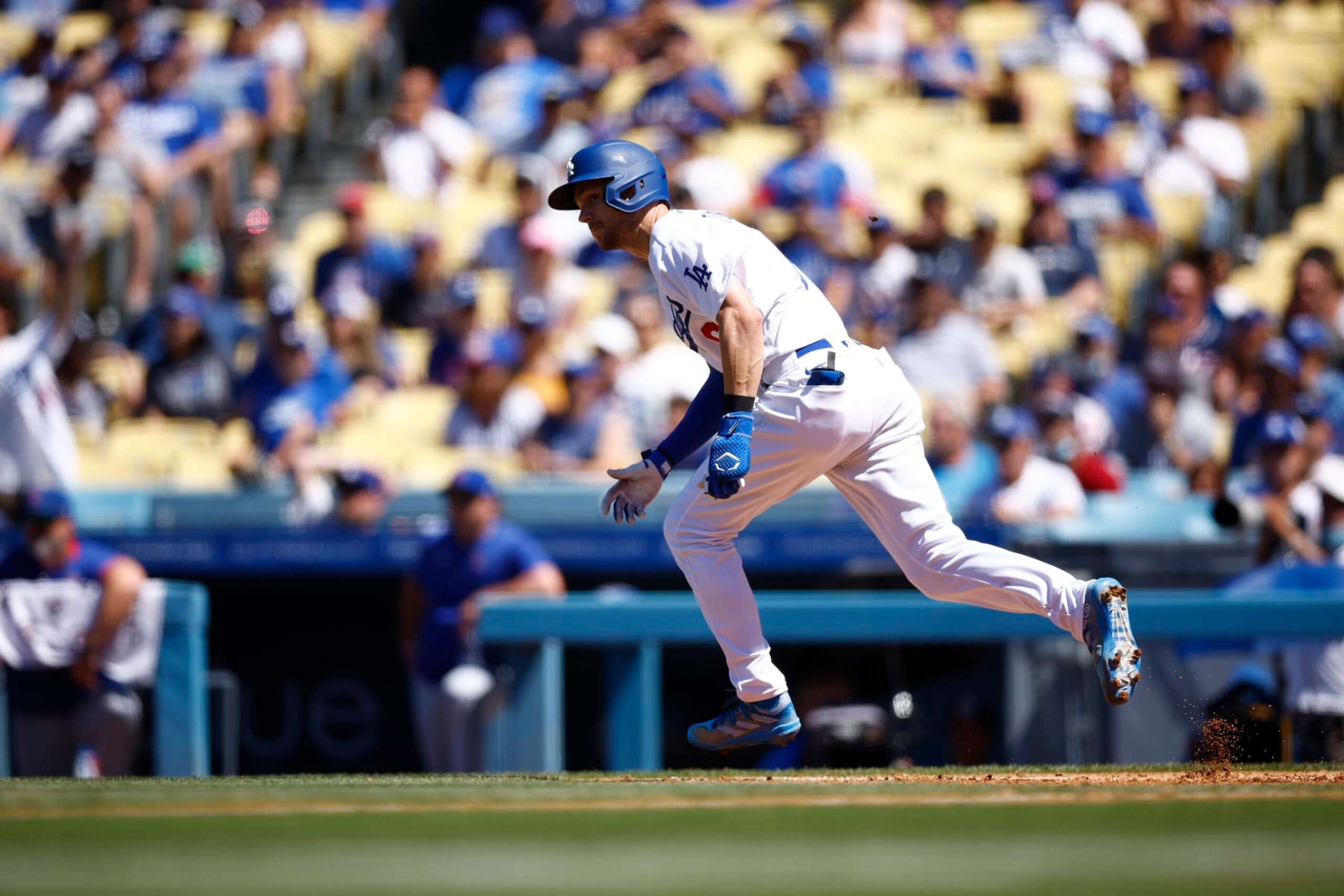 LOS ANGELES, CALIFORNIA - JULY 10:  Trea Turner #6 of the Los Angeles Dodgers hits a two-run rbi single against the Chicago Cubs in the third inning at Dodger Stadium on July 10, 2022 in Los Angeles, California. (Photo by Ronald Martinez/Getty Images)