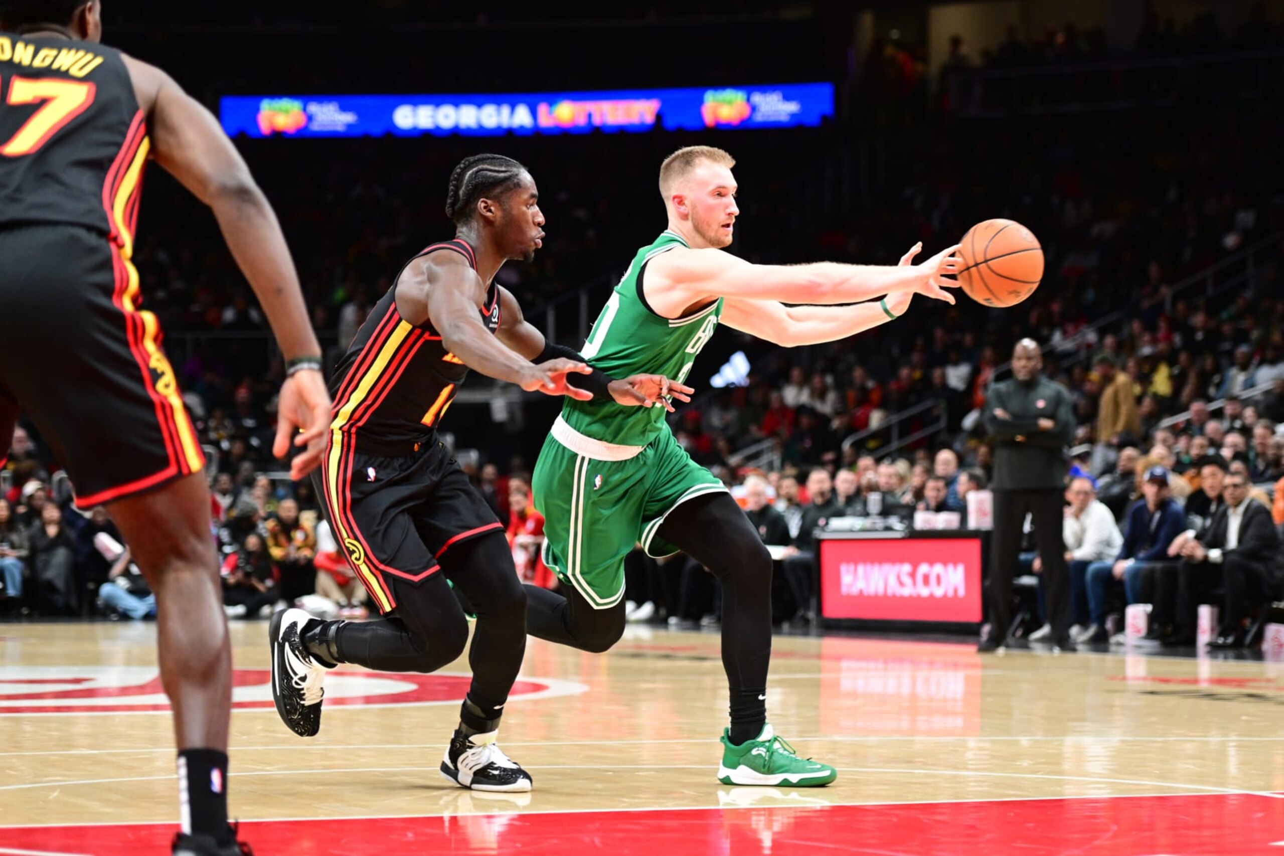 ATLANTA, GA - NOVEMBER 16: Sam Hauser #30 of the Boston Celtics passes the ball during the game against the Atlanta Hawks on November 16, 2022 at State Farm Arena in Atlanta, Georgia. NOTE TO USER: User expressly acknowledges and agrees that, by downloading and/or using this Photograph, user is consenting to the terms and conditions of the Getty Images License Agreement. Mandatory Copyright Notice: Copyright 2022 NBAE (Photo by Adam Hagy/NBAE via Getty Images) ATLANTA, GA - NOVEMBER 16: Sam Hauser #30 of the Boston Celtics passes the ball during the game against the Atlanta Hawks on November 16, 2022 at State Farm Arena in Atlanta, Georgia. NOTE TO USER: User expressly acknowledges and agrees that, by downloading and/or using this Photograph, user is consenting to the terms and conditions of the Getty Images License Agreement. Mandatory Copyright Notice: Copyright 2022 NBAE (Photo by Adam Hagy/NBAE via Getty Images)