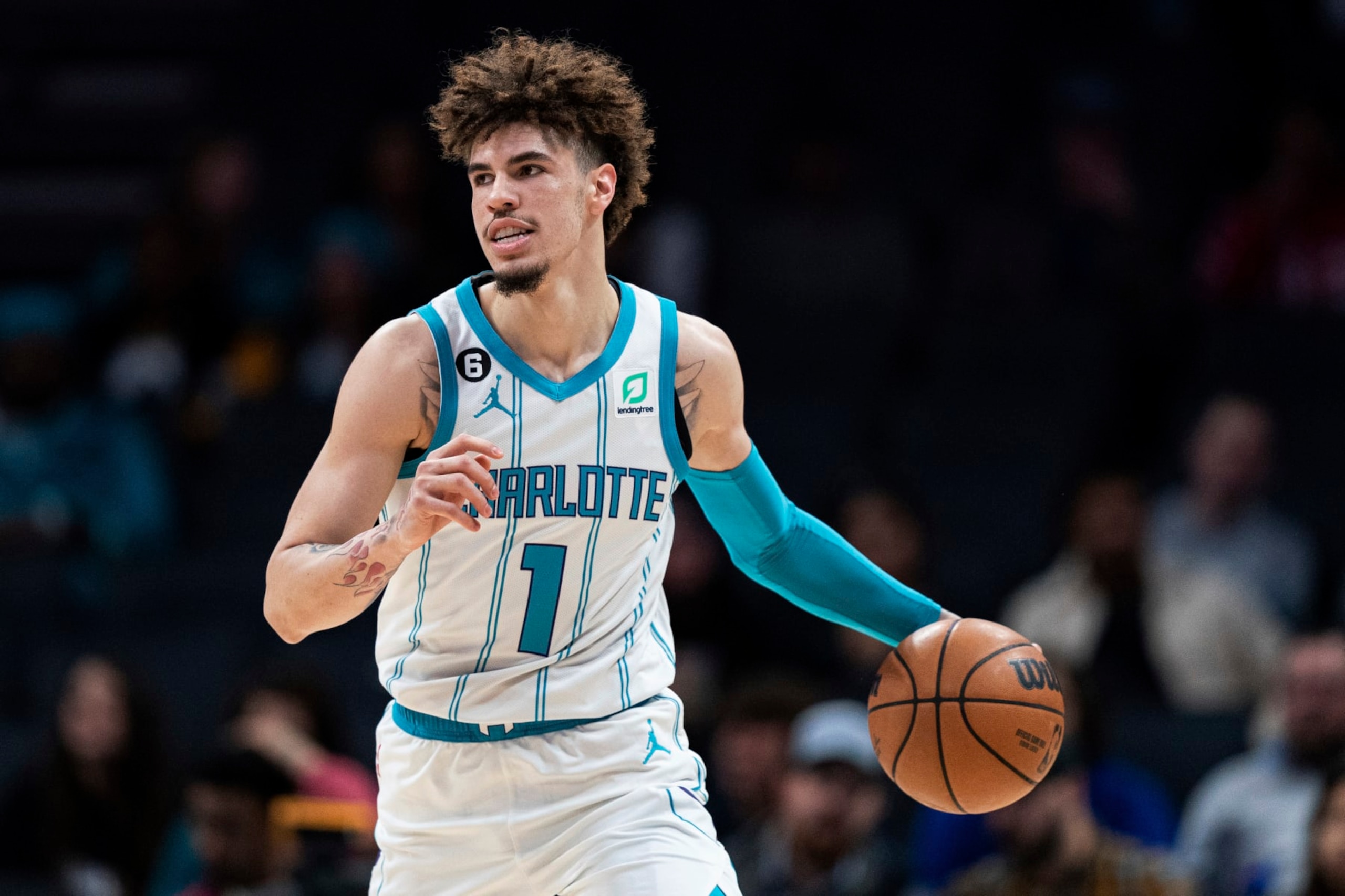 Charlotte Hornets guard LaMelo Ball brings the ball up during the first half of the team's NBA basketball game against the Indiana Pacers in Charlotte, N.C., Wednesday, Nov. 16, 2022. (AP Photo/Jacob Kupferman) Charlotte Hornets guard LaMelo Ball brings the ball up during the first half of the team's NBA basketball game against the Indiana Pacers in Charlotte, N.C., Wednesday, Nov. 16, 2022. (AP Photo/Jacob Kupferman)