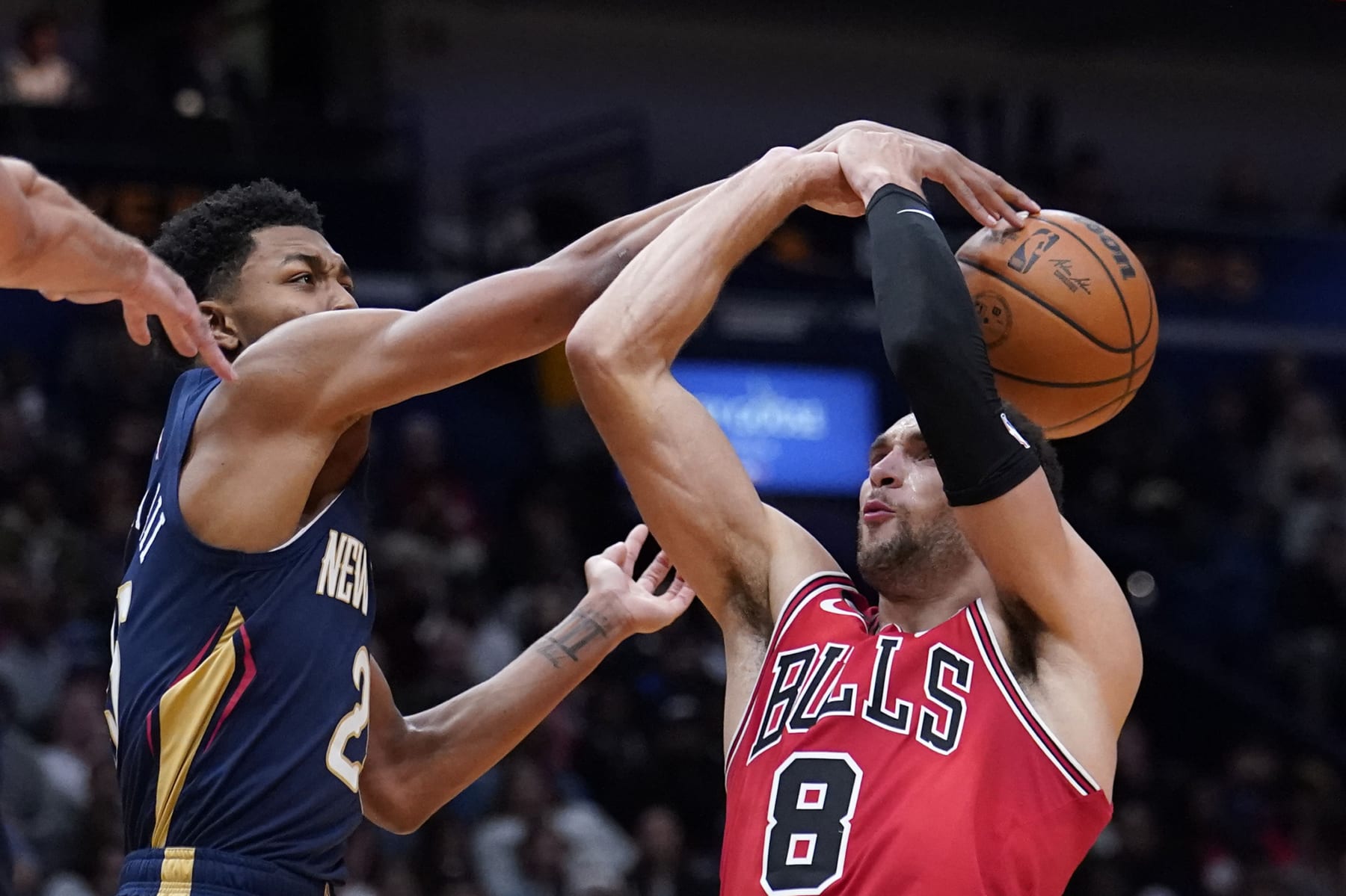 New Orleans Pelicans guard Trey Murphy III (25) blocks a shot by Chicago Bulls guard Zach LaVine (8) in the first half of an NBA basketball game in New Orleans, Wednesday, Nov. 16, 2022. (AP Photo/Gerald Herbert)