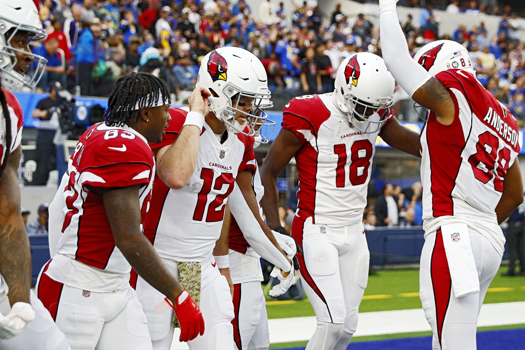 INGLEWOOD, CALIFORNIA - NOVEMBER 13: Colt McCoy #12 of the Arizona Cardinals celebrates with teammates after a touchdown in the second quarter of the game against the Los Angeles Rams at SoFi Stadium on November 13, 2022 in Inglewood, California. (Photo by Ronald Martinez/Getty Images)