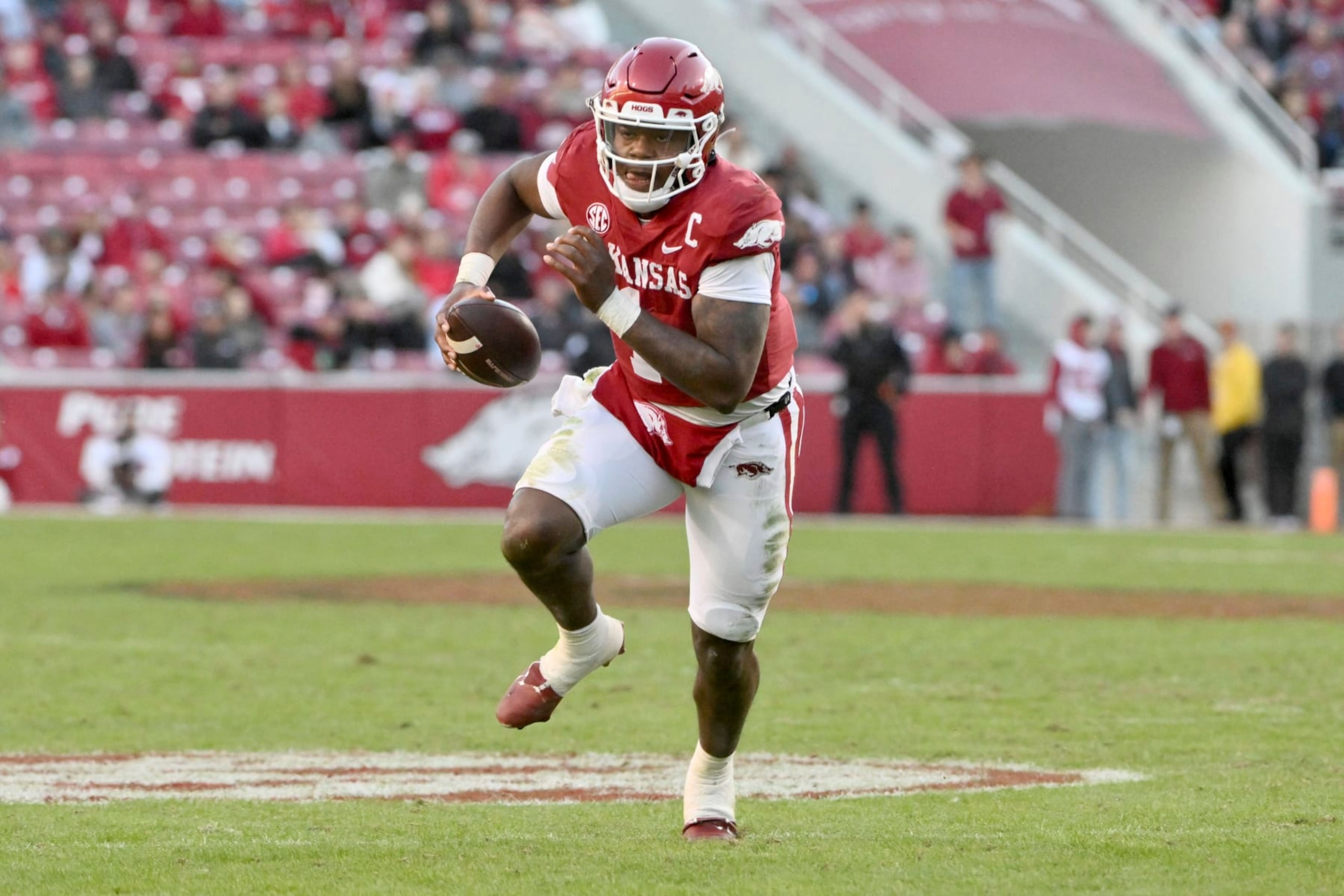 Arkansas quarterback KJ Jefferson (1) runs the ball against Liberty during the second half of an NCAA college football game Saturday, Nov. 5, 2022, in Fayetteville, Ark. (AP Photo/Michael Woods) Arkansas quarterback KJ Jefferson (1) runs the ball against Liberty during the second half of an NCAA college football game Saturday, Nov. 5, 2022, in Fayetteville, Ark. (AP Photo/Michael Woods)