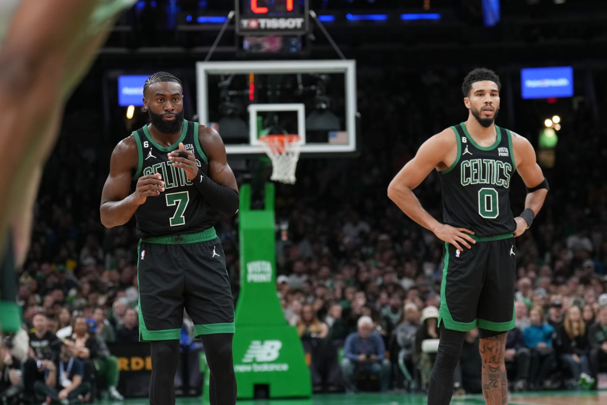 BOSTON, MA - OCTOBER 28: Jaylen Brown #7 and Jayson Tatum #0 of the Boston Celtics look on during the game against the Cleveland Cavaliers on October 28, 2022 at the TD Garden in Boston, Massachusetts.  NOTE TO USER: User expressly acknowledges and agrees that, by downloading and or using this photograph, User is consenting to the terms and conditions of the Getty Images License Agreement. Mandatory Copyright Notice: Copyright 2022 NBAE  (Photo by Jesse D. Garrabrant/NBAE via Getty Images)