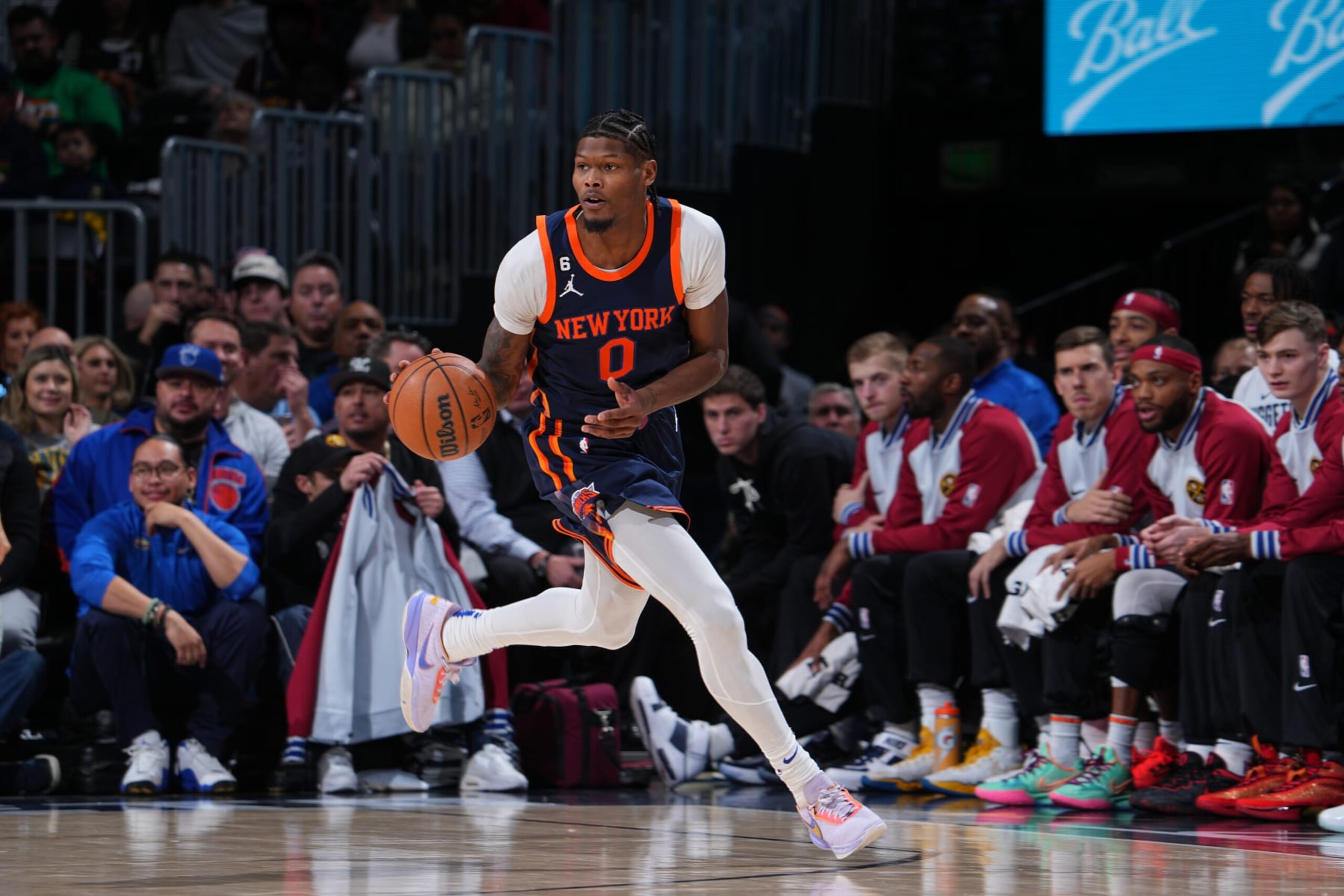 DENVER, CO - NOVEMBER 16: Cam Reddish #0 of the New York Knicks dribbles the ball during the game against the Denver Nuggets on November 16, 2022 at the Ball Arena in Denver, Colorado. NOTE TO USER: User expressly acknowledges and agrees that, by downloading and/or using this Photograph, user is consenting to the terms and conditions of the Getty Images License Agreement. Mandatory Copyright Notice: Copyright 2022 NBAE (Photo by Bart Young/NBAE via Getty Images)