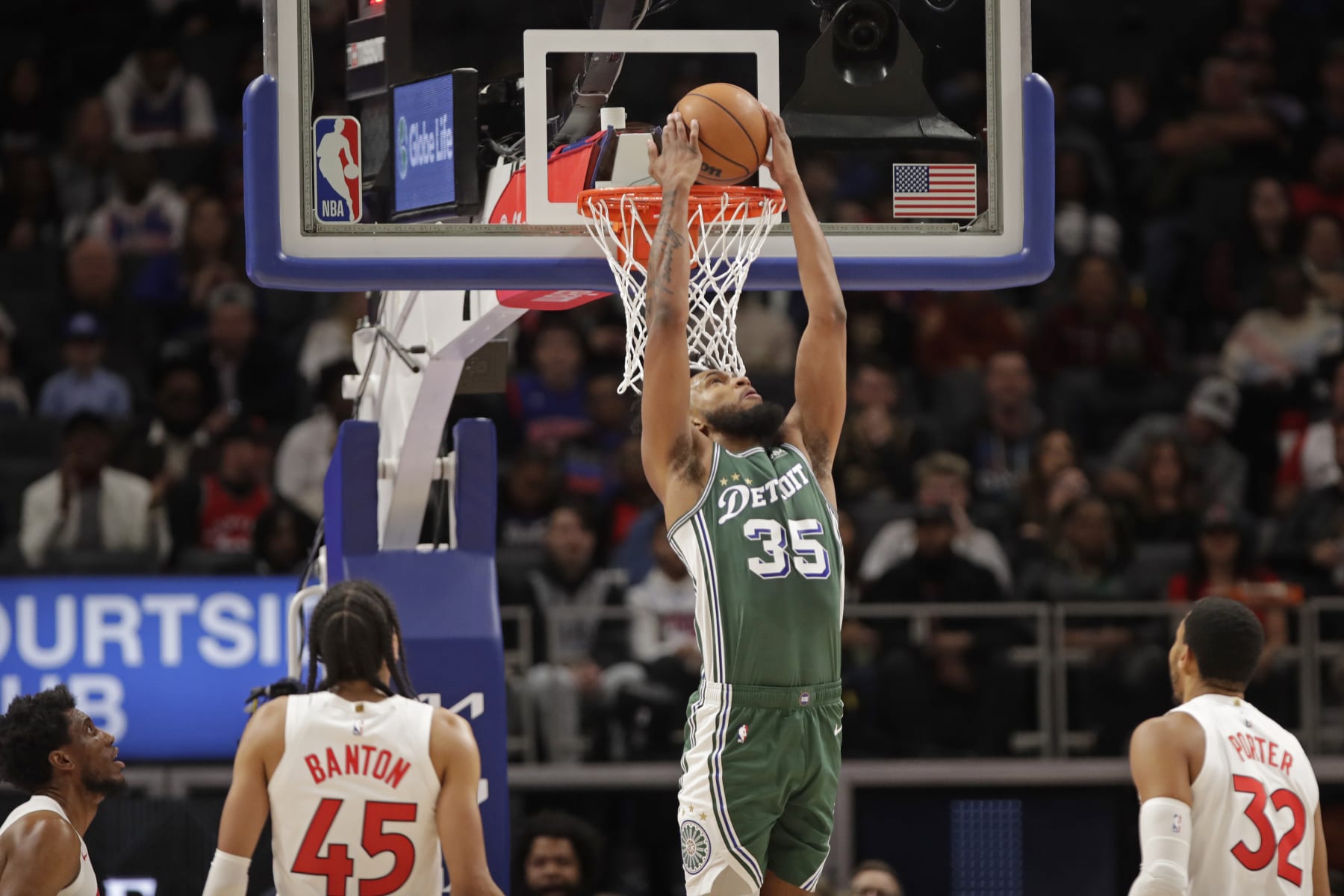 DETROIT, MI - NOVEMBER 14:  Marvin Bagley #35 of the Detroit Pistons dunks the ball against the Toronto Raptors on November 14, 2022 at Little Caesars Arena in Detroit, Michigan. NOTE TO USER: User expressly acknowledges and agrees that, by downloading and/or using this photograph, User is consenting to the terms and conditions of the Getty Images License Agreement. Mandatory Copyright Notice: Copyright 2022 NBAE (Photo by Brian Sevald/NBAE via Getty Images)