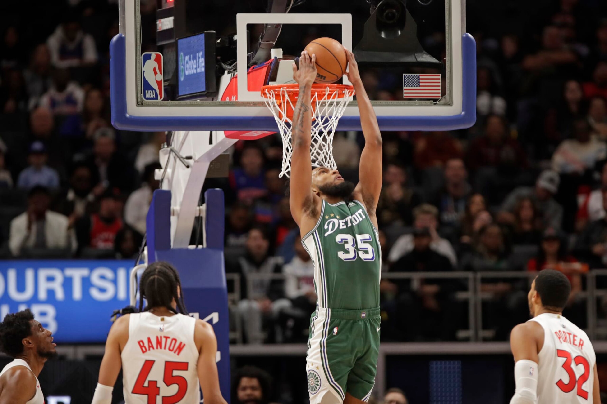DETROIT, MI - NOVEMBER 14:  Marvin Bagley #35 of the Detroit Pistons dunks the ball against the Toronto Raptors on November 14, 2022 at Little Caesars Arena in Detroit, Michigan. NOTE TO USER: User expressly acknowledges and agrees that, by downloading and/or using this photograph, User is consenting to the terms and conditions of the Getty Images License Agreement. Mandatory Copyright Notice: Copyright 2022 NBAE (Photo by Brian Sevald/NBAE via Getty Images)