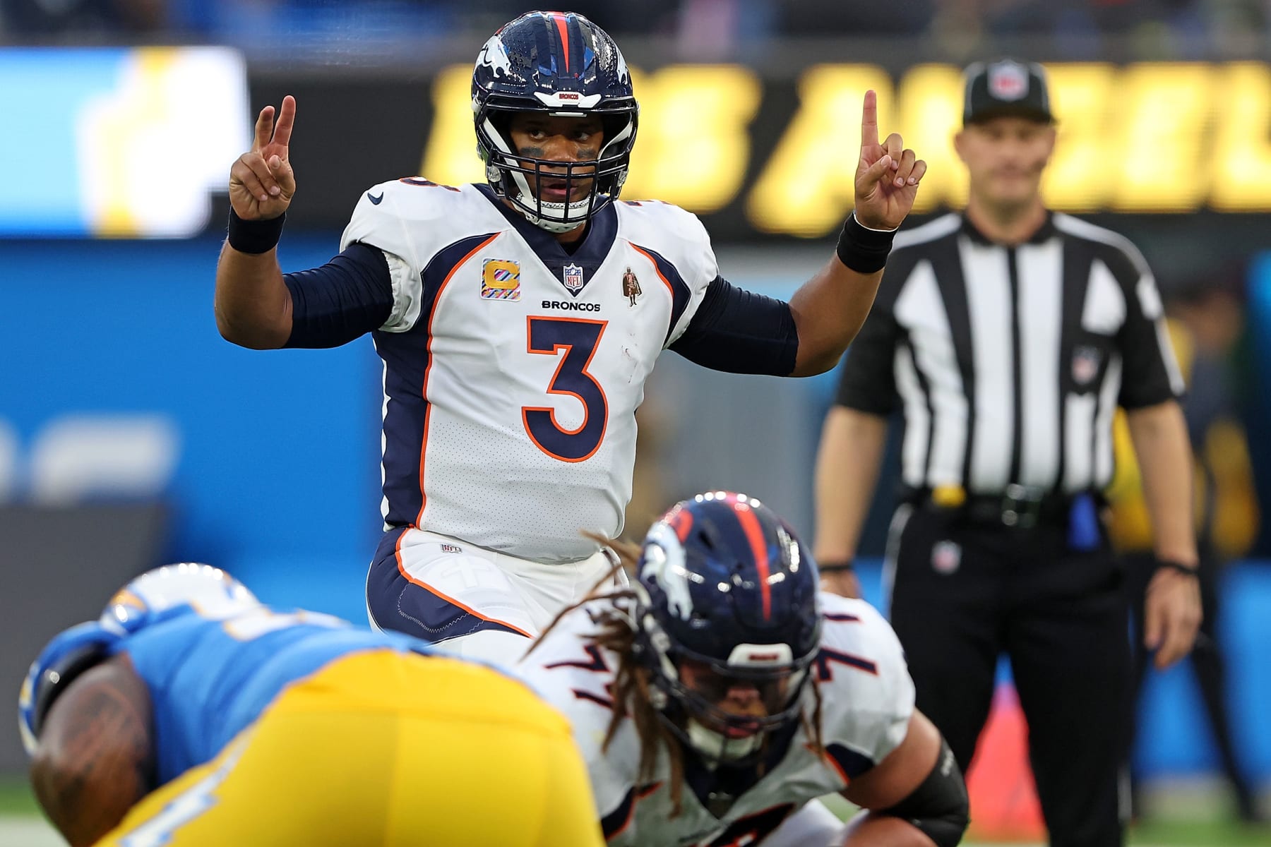 INGLEWOOD, CALIFORNIA - OCTOBER 17: Russell Wilson #3 of the Denver Broncos calls a play at the line during the first quarter against the Los Angeles Chargers at SoFi Stadium on October 17, 2022 in Inglewood, California. (Photo by Sean M. Haffey/Getty Images)