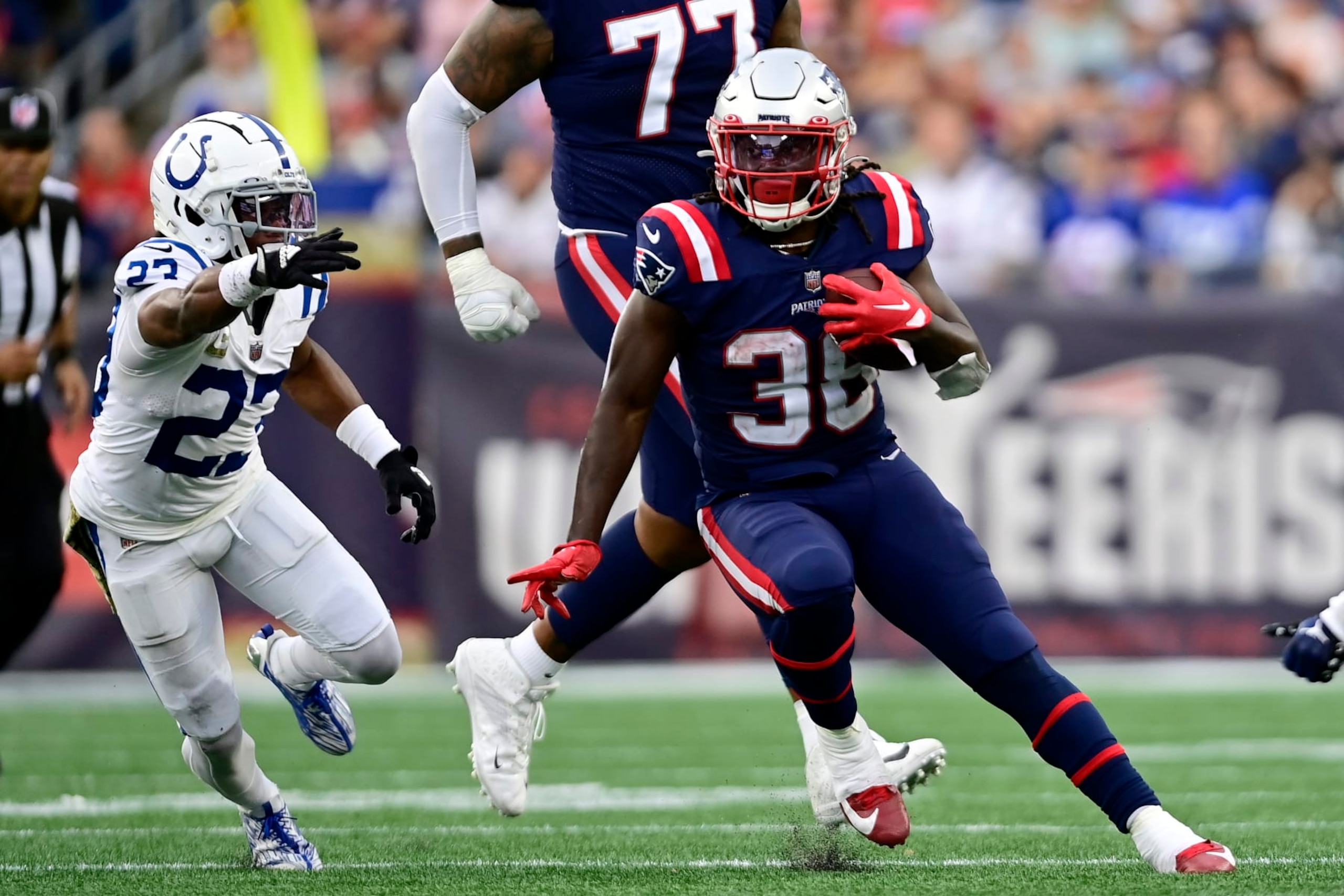 FOXBOROUGH, MASSACHUSETTS - NOVEMBER 06: Rhamondre Stevenson #38 of the New England Patriots runs with the ball during the second half of a game against the Indianapolis Colts at Gillette Stadium on November 06, 2022 in Foxborough, Massachusetts. (Photo by Maddie Malhotra/Getty Images) FOXBOROUGH, MASSACHUSETTS - NOVEMBER 06: Rhamondre Stevenson #38 of the New England Patriots runs with the ball during the second half of a game against the Indianapolis Colts at Gillette Stadium on November 06, 2022 in Foxborough, Massachusetts. (Photo by Maddie Malhotra/Getty Images)