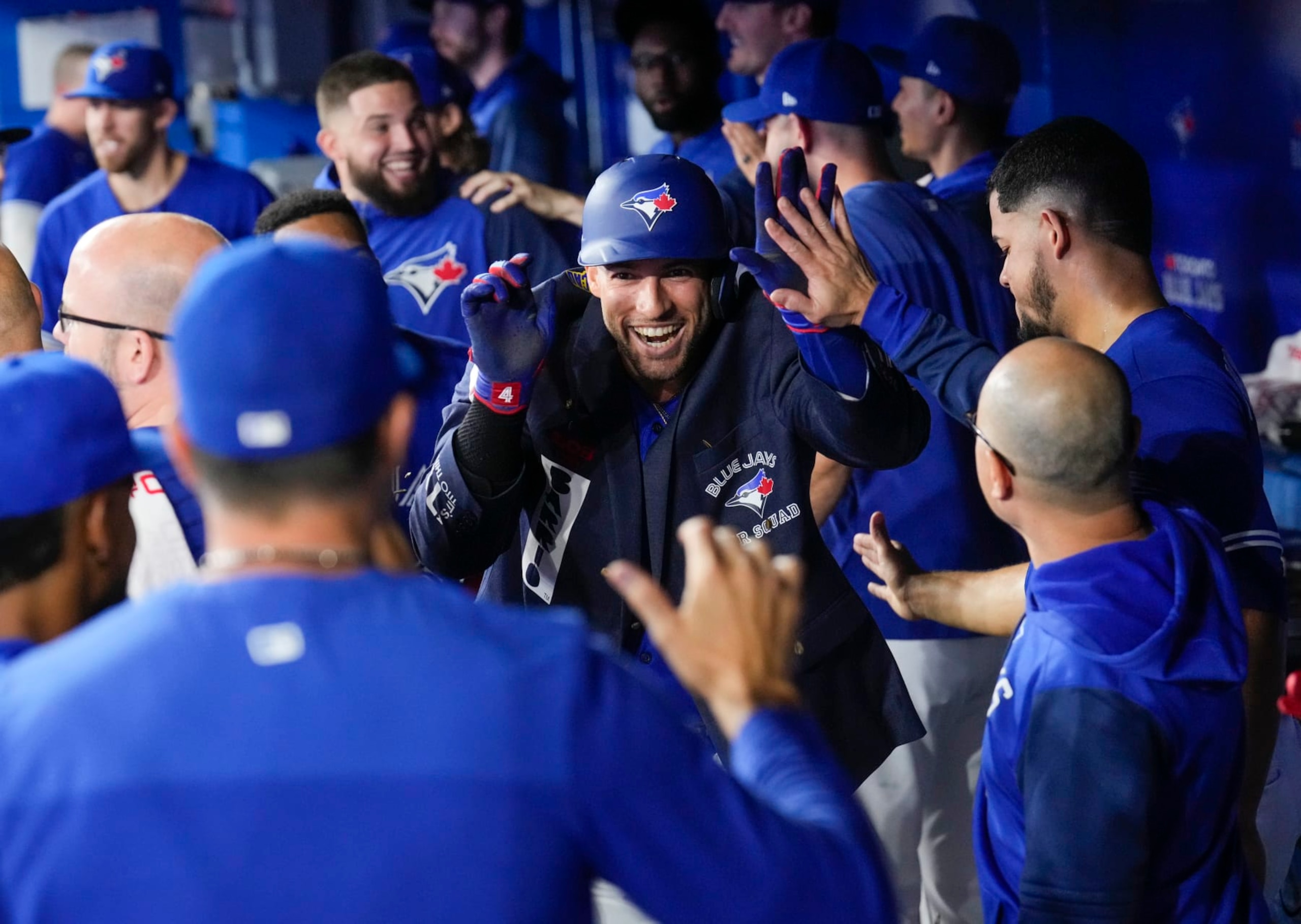 TORONTO, ON - SEPTEMBER 27: George Springer #4 of the Toronto Blue Jays celebrates his home run with the blue jacket against the New York Yankees in the first inning during their MLB game at the Rogers Centre on September 27, 2022 in Toronto, Ontario, Canada. (Photo by Mark Blinch/Getty Images)