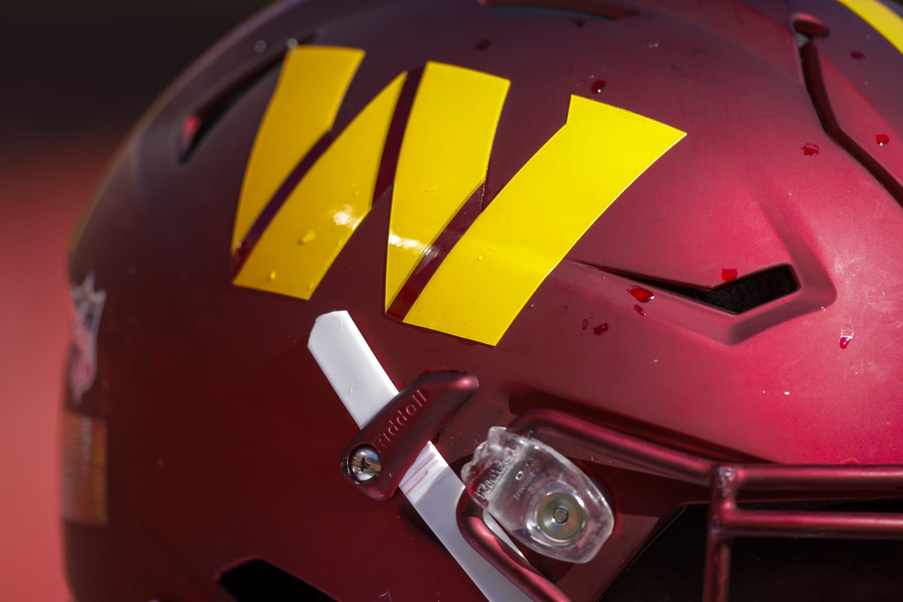 KANSAS CITY, MO - AUGUST 20: The gold Washington Commanders helmet logo on the burgundy helmet, worn by Willie Beavers #64 of the Washington Commanders during the preseason game against the Kansas City Chiefs at Arrowhead Stadium on August 20, 2022 in Kansas City, Missouri. (Photo by David Eulitt/Getty Images)