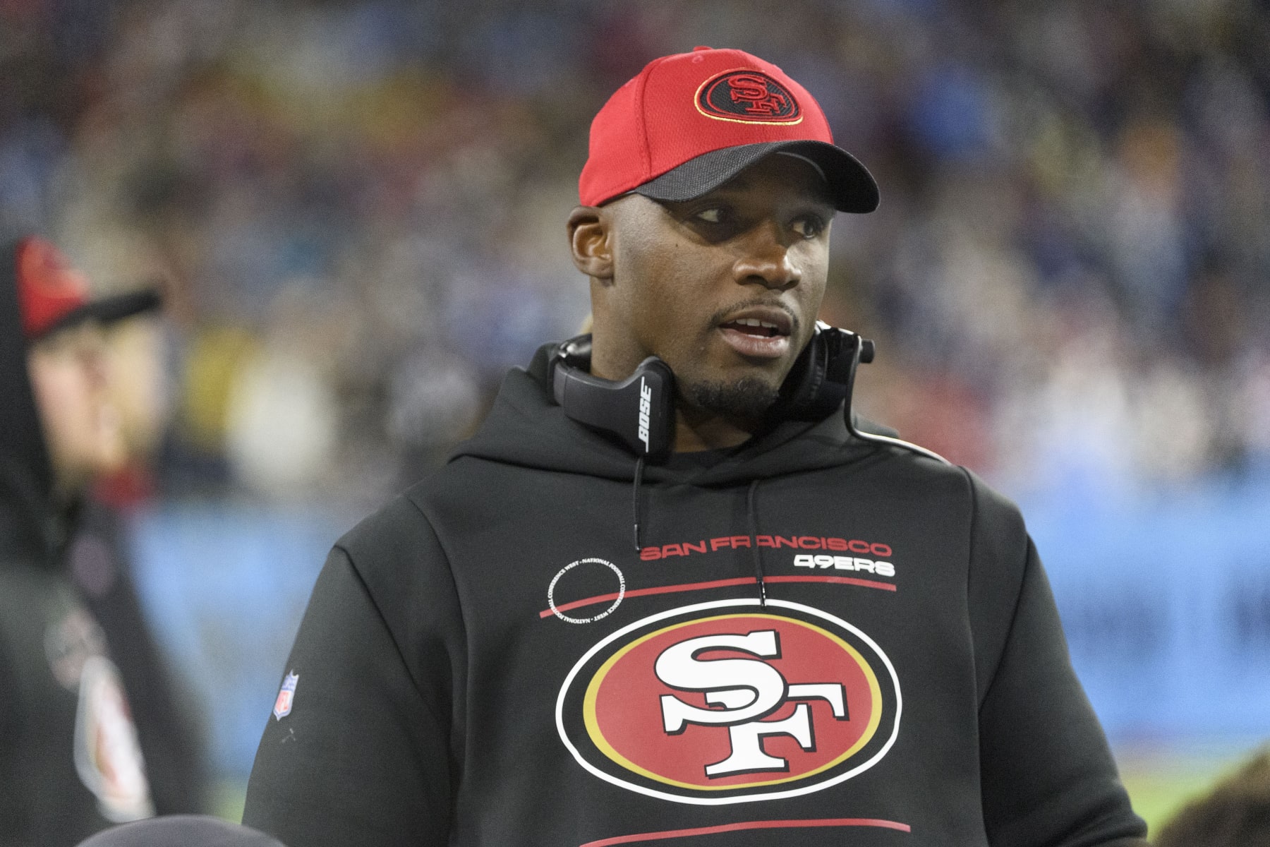 San Francisco 49ers defensive coordinator DeMeco Ryans works the sideline during an NFL football game against the Tennessee Titans, Thursday, Dec. 23, 2021, in Nashville, Tenn. (AP Photo/John Amis)