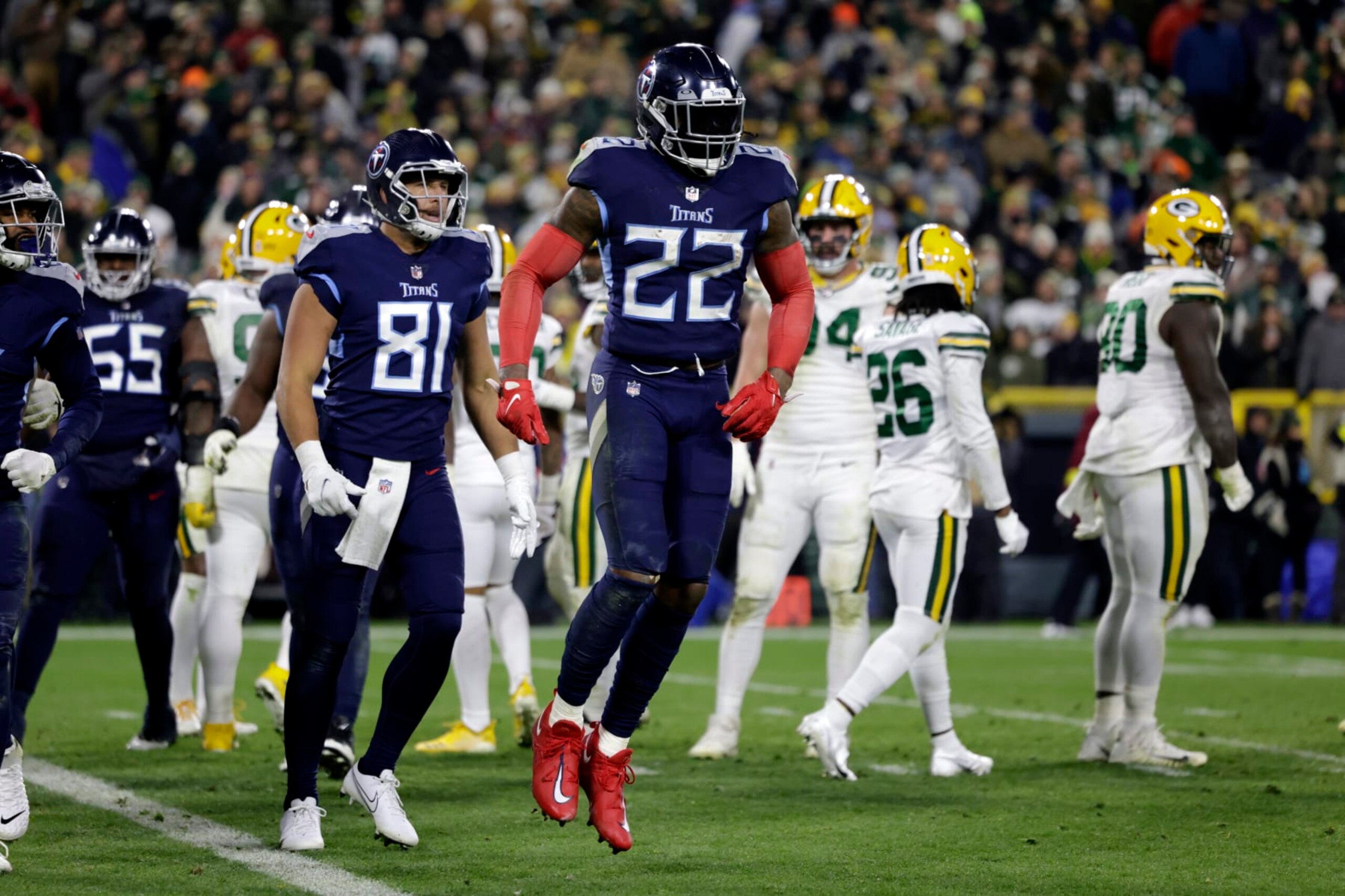 Tennessee Titans running back Derrick Henry (22) and Austin Hooper (81) celebrate after Henry ran for a touchdown during the first half of an NFL football game against the Green Bay Packers, Thursday, Nov. 17, 2022, in Green Bay, Wis. (AP Photo/Matt Ludtke) Tennessee Titans running back Derrick Henry (22) and Austin Hooper (81) celebrate after Henry ran for a touchdown during the first half of an NFL football game against the Green Bay Packers, Thursday, Nov. 17, 2022, in Green Bay, Wis. (AP Photo/Matt Ludtke)