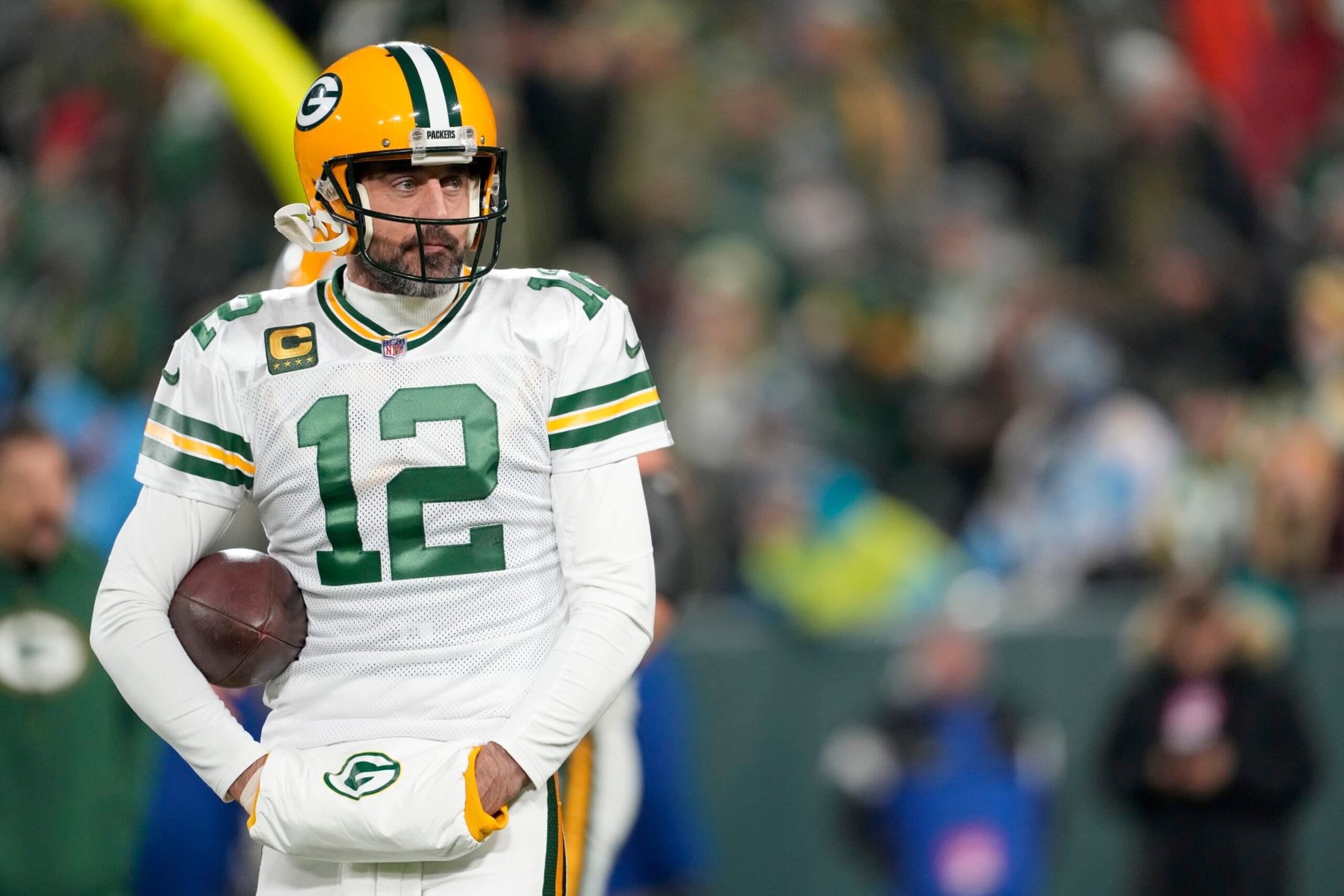GREEN BAY, WISCONSIN - NOVEMBER 17: Aaron Rodgers #12 of the Green Bay Packers warms up prior to the game against the Tennessee Titans at Lambeau Field on November 17, 2022 in Green Bay, Wisconsin. (Photo by Patrick McDermott/Getty Images)