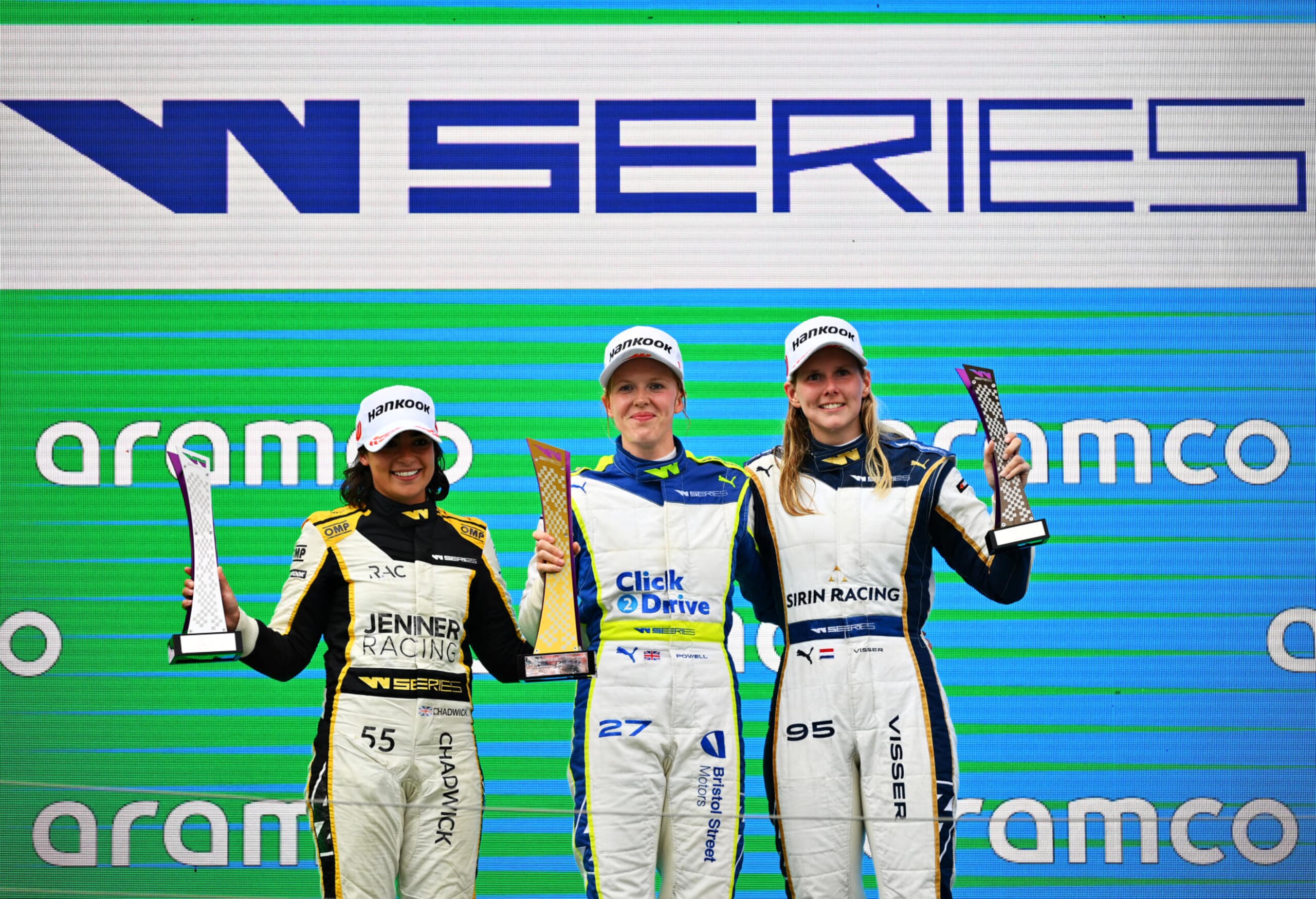 BUDAPEST, HUNGARY - JULY 30: Race winner Alice Powell of Great Britain and Click2Drive Bristol Street Motors Racing (C), Second placed Jamie Chadwick of Great Britain and Jenner Racing (L) and Third placed Beitske Visser of Netherlands and Sirin Racing (R) celebrate on the podium during the W Series Round 5 race at Hungaroring on July 30, 2022 in Budapest, Hungary. (Photo by Dan Mullan/Getty Images)