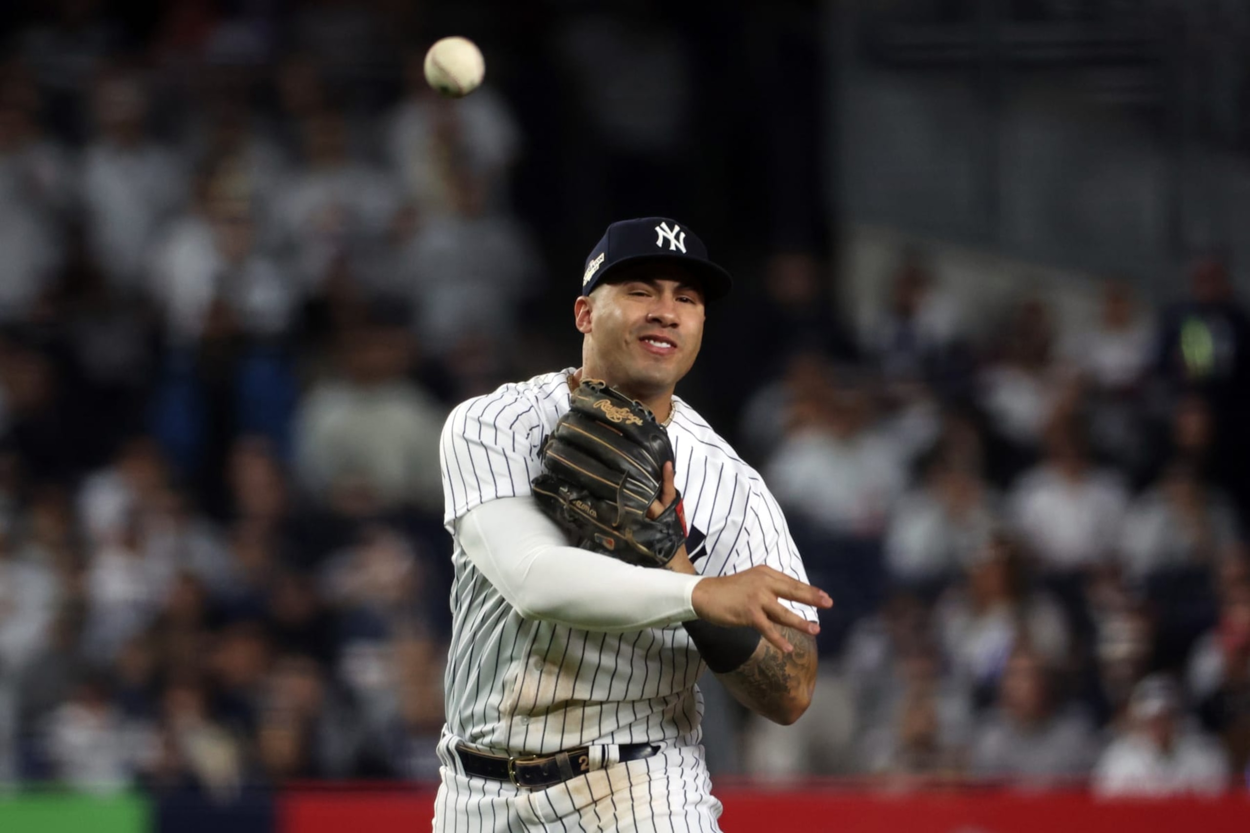 NEW YORK, NY - OCTOBER 22:  Gleyber Torres #25 of the New York Yankees throws to first base for the out during Game 3 of the ALCS between the Houston Astros and the New York Yankees at Yankee Stadium on Saturday, October 22, 2022 in New York, New York. (Photo by Mary DeCicco/MLB Photos via Getty Images)