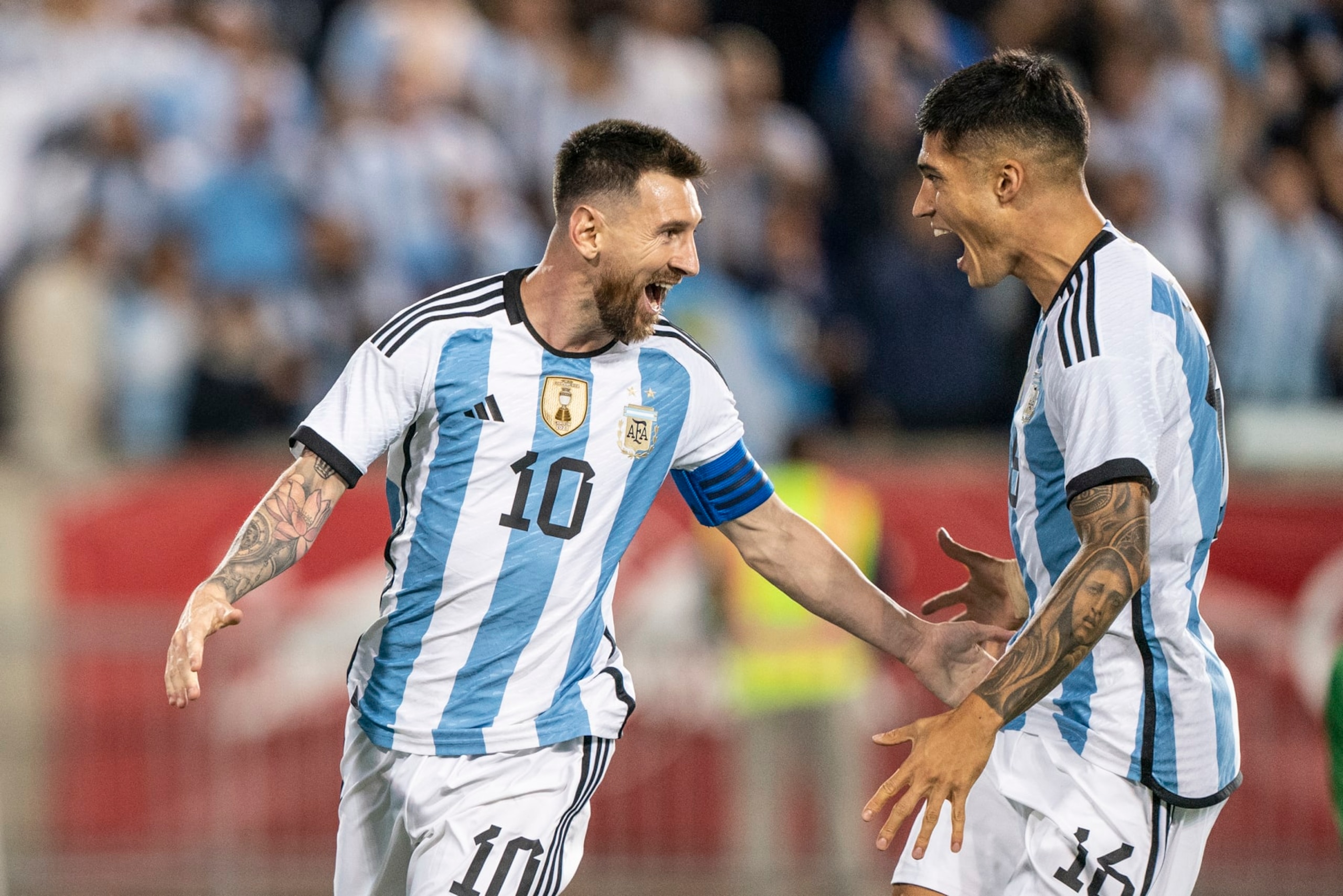 NEW YORK, UNITED STATES - 2022/09/27: Lionel Messi (10) of Argentina celebrates with Carlos Joaquin Correa (16) scoring a goal during a friendly football game against Jamaica at Red Bull Arena. Argentina won 3 - 0. Friendly game played in preparation for the World Cup to be held in Qatar in November 2022. Three intruders were apprehended by security personnel after they invaded the pitch during the game trying to reach Lionel Messi of Argentina. (Photo by Lev Radin/Pacific Press/LightRocket via Getty Images) NEW YORK, UNITED STATES - 2022/09/27: Lionel Messi (10) of Argentina celebrates with Carlos Joaquin Correa (16) scoring a goal during a friendly football game against Jamaica at Red Bull Arena. Argentina won 3 - 0. Friendly game played in preparation for the World Cup to be held in Qatar in November 2022. Three intruders were apprehended by security personnel after they invaded the pitch during the game trying to reach Lionel Messi of Argentina. (Photo by Lev Radin/Pacific Press/LightRocket via Getty Images)