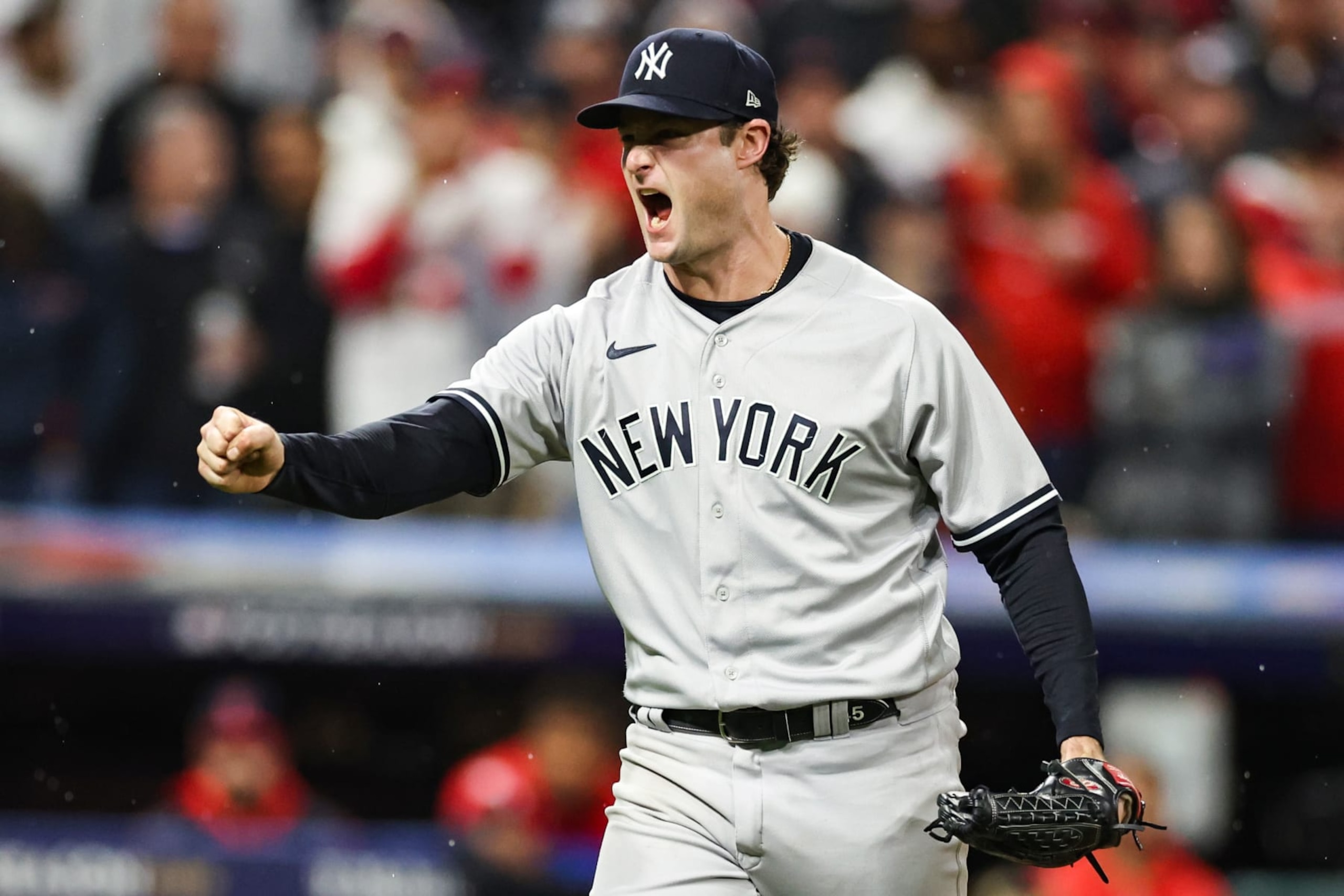 CLEVELAND, OHIO - OCTOBER 16: Gerrit Cole #45 of the New York Yankees reacts after a strikeout against the Cleveland Guardians during the seventh inning in game four of the American League Division Series at Progressive Field on October 16, 2022 in Cleveland, Ohio. (Photo by Christian Petersen/Getty Images) CLEVELAND, OHIO - OCTOBER 16: Gerrit Cole #45 of the New York Yankees reacts after a strikeout against the Cleveland Guardians during the seventh inning in game four of the American League Division Series at Progressive Field on October 16, 2022 in Cleveland, Ohio. (Photo by Christian Petersen/Getty Images)