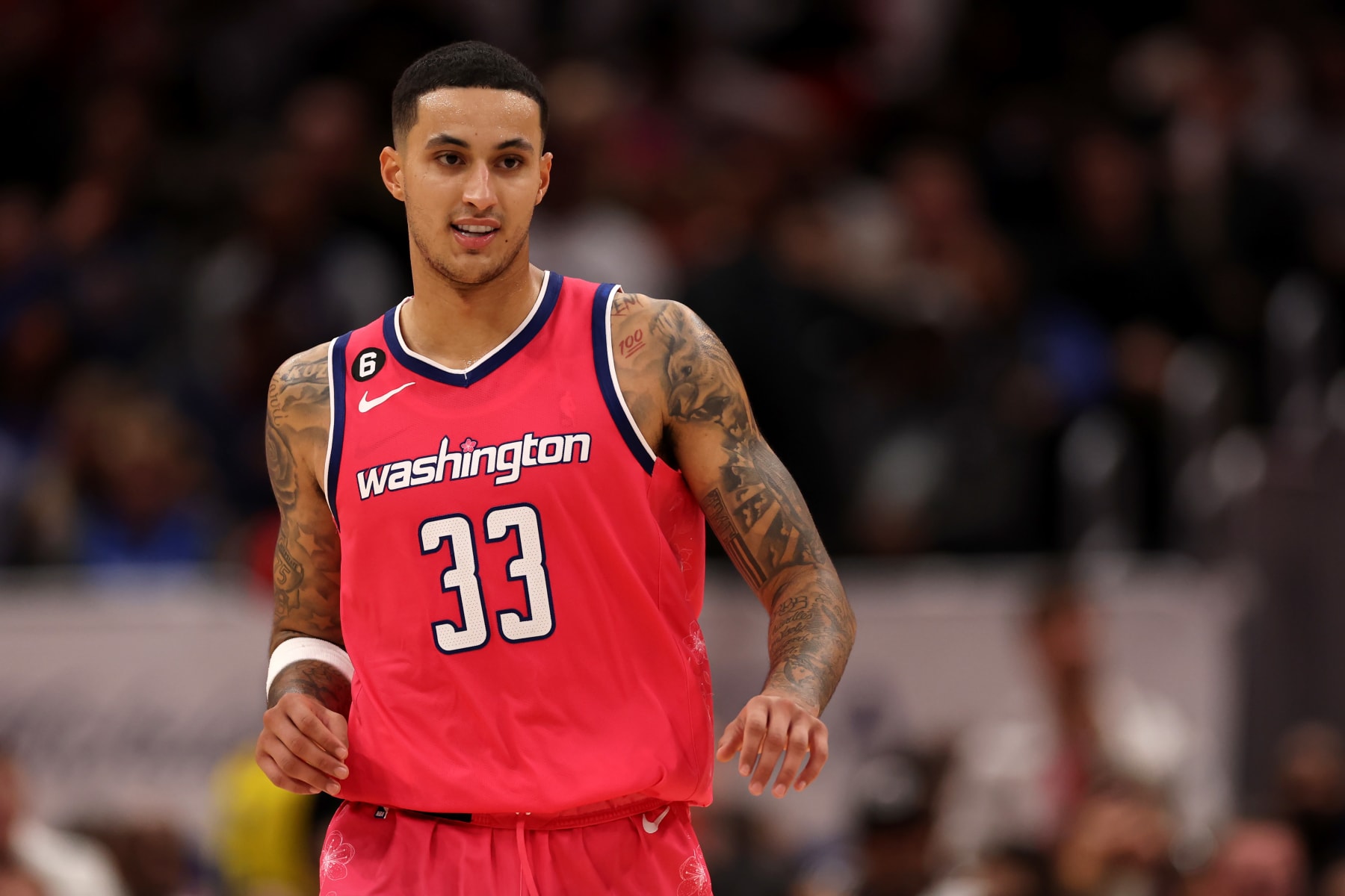 WASHINGTON, DC - NOVEMBER 10: Kyle Kuzma #33 of the Washington Wizards celebrates after scoring against the Dallas Mavericks at Capital One Arena on November 10, 2022 in Washington, DC. NOTE TO USER: User expressly acknowledges and agrees that, by downloading and or using this photograph, User is consenting to the terms and conditions of the Getty Images License Agreement.  (Photo by Rob Carr/Getty Images)