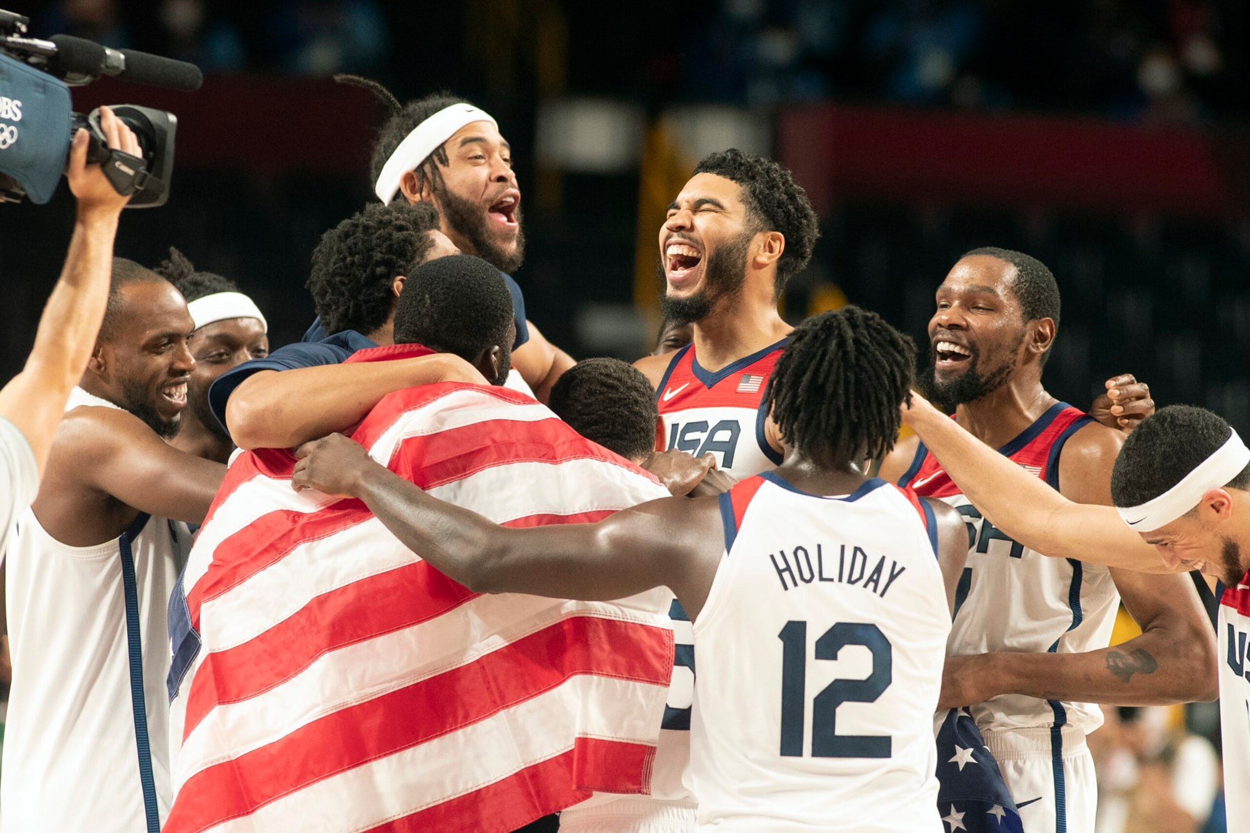 TOKYO, JAPAN August 7: The United States team  celebrate their gold medal win during the France V USA basketball final for men at the Saitama Super Arena during the Tokyo 2020 Summer Olympic Games on August 7, 2021 in Tokyo, Japan. (Photo by Tim Clayton/Corbis via Getty Images)