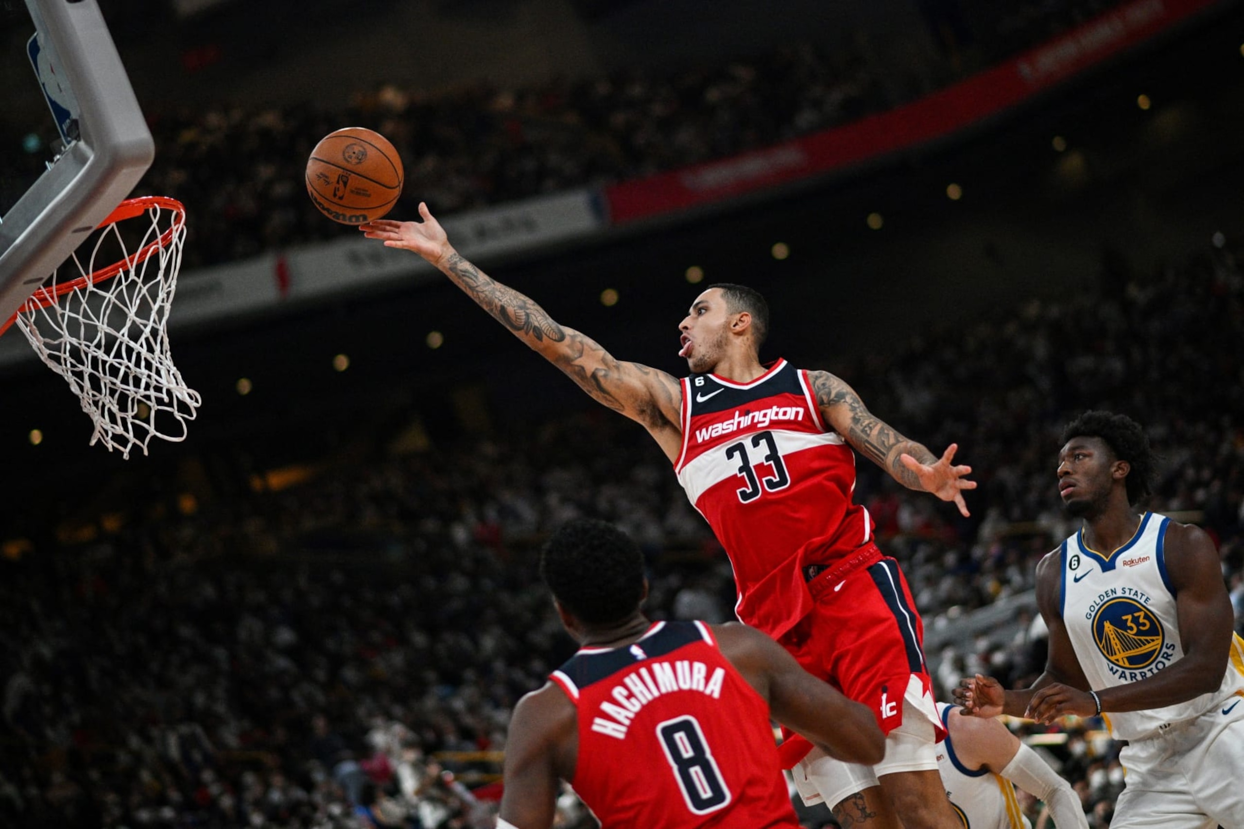 Washington Wizards' Kyle Kuzma shoots during the NBA Japan Games 2022 pre-season basketball game between the Golden State Warriors and Washington Wizards at the Saitama Super Arena in Saitama on October 2, 2022. (Photo by Philip FONG / AFP) (Photo by PHILIP FONG/AFP via Getty Images)