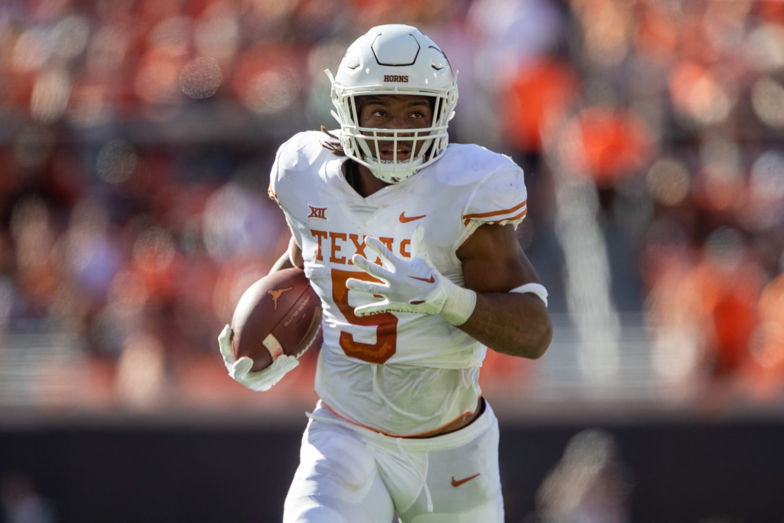 STILLWATER, OK - OCTOBER 22: Texas Longhorns running back Bijan Robinson (5) heads to the end zone for a touchdown during the first half against the Oklahoma State Cowboys on October 22nd, 2022 at Boone Pickens Stadium in Stillwater, Oklahoma. (Photo by William Purnell/Icon Sportswire via Getty Images)