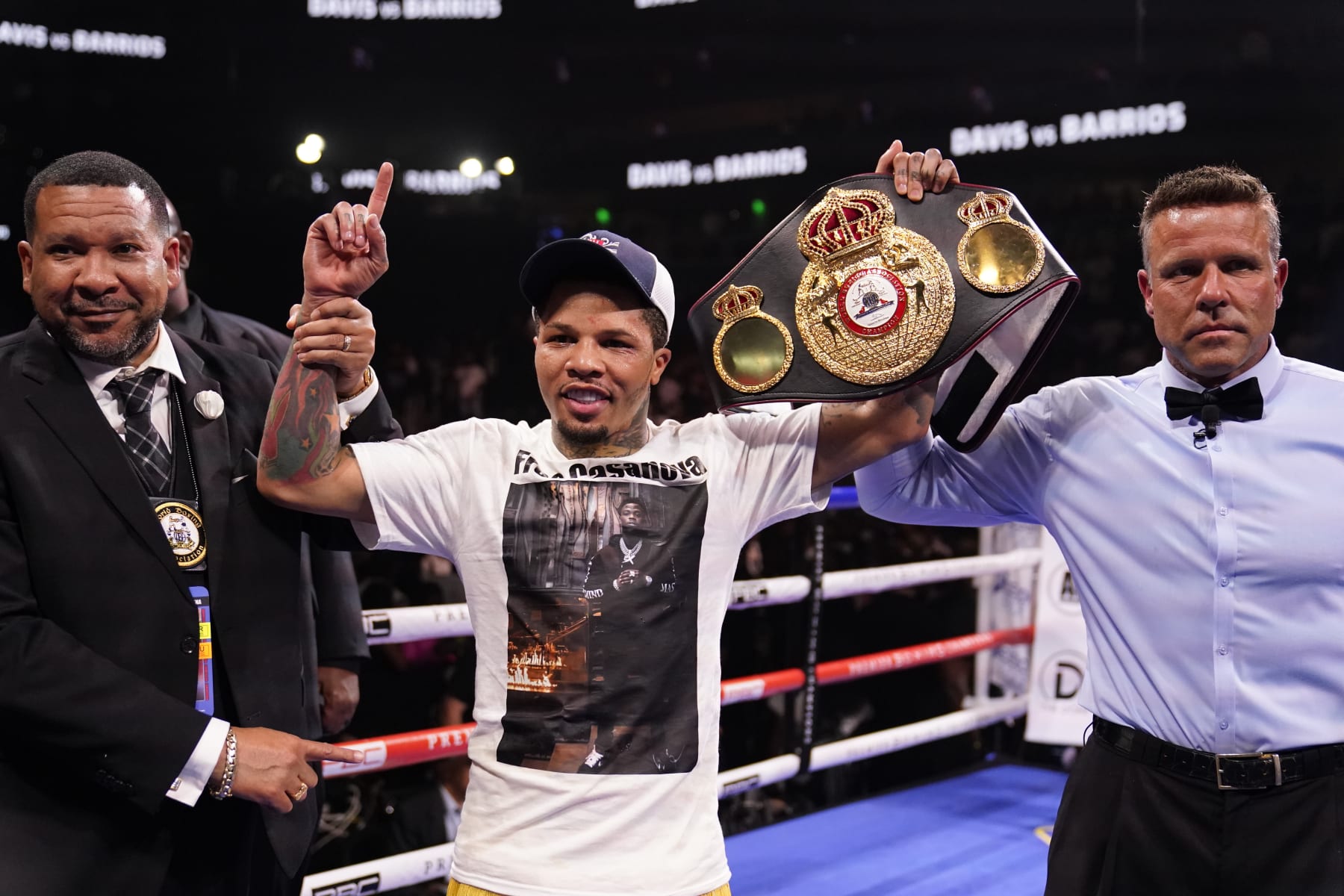 Gervonta Davis holds up his belt after he knocked out Mario Barrios in the 11th round of the WBA Super Lightweight world championship boxing match on Sunday, June 27, 2021, in Atlanta. Davis won against Barrios. (AP Photo/Brynn Anderson)