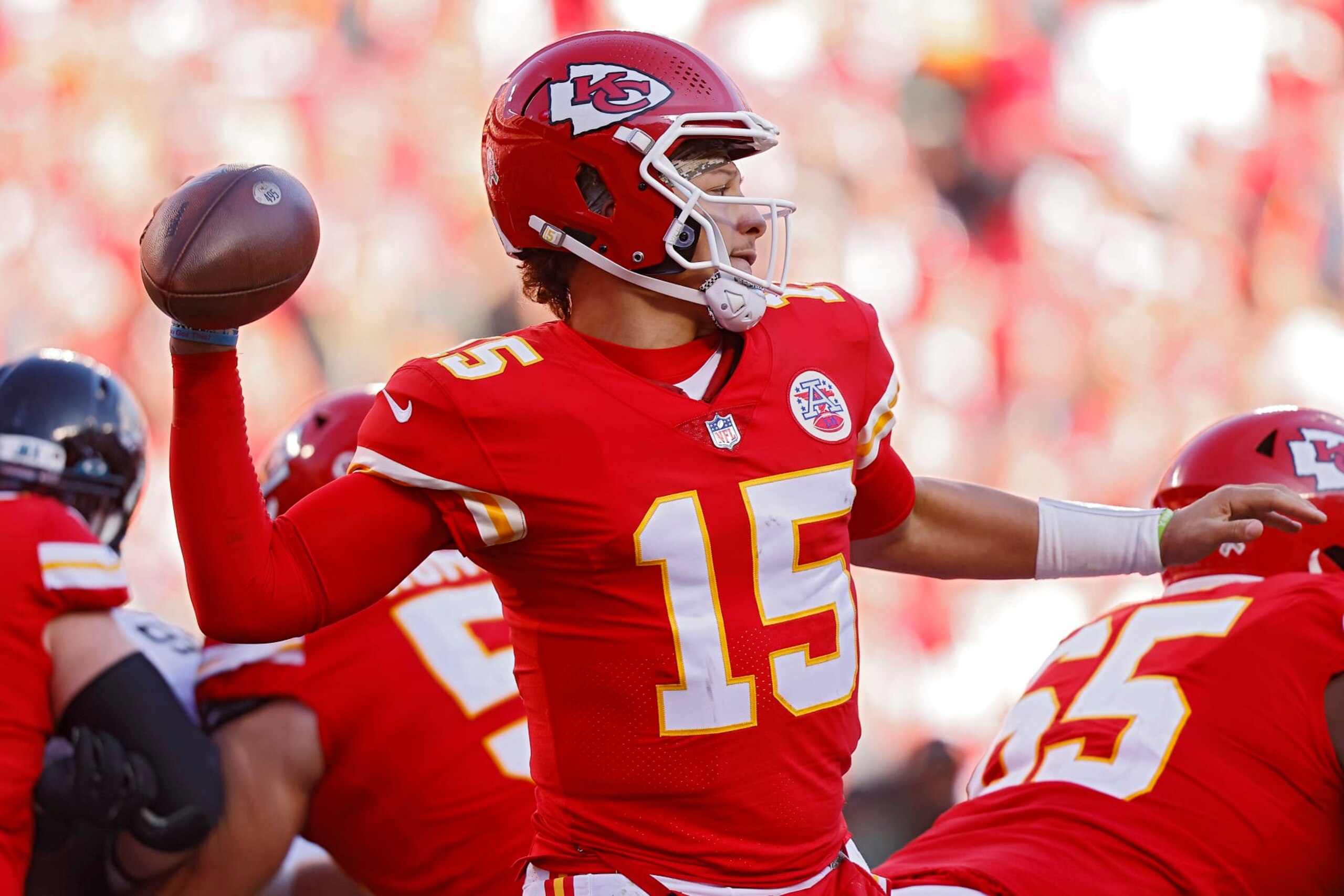 KANSAS CITY, MISSOURI - NOVEMBER 13: Patrick Mahomes #15 of the Kansas City Chiefs throws the ball in the fourth quarter of the game against the Jacksonville Jaguars at Arrowhead Stadium on November 13, 2022 in Kansas City, Missouri. (Photo by David Eulitt/Getty Images)