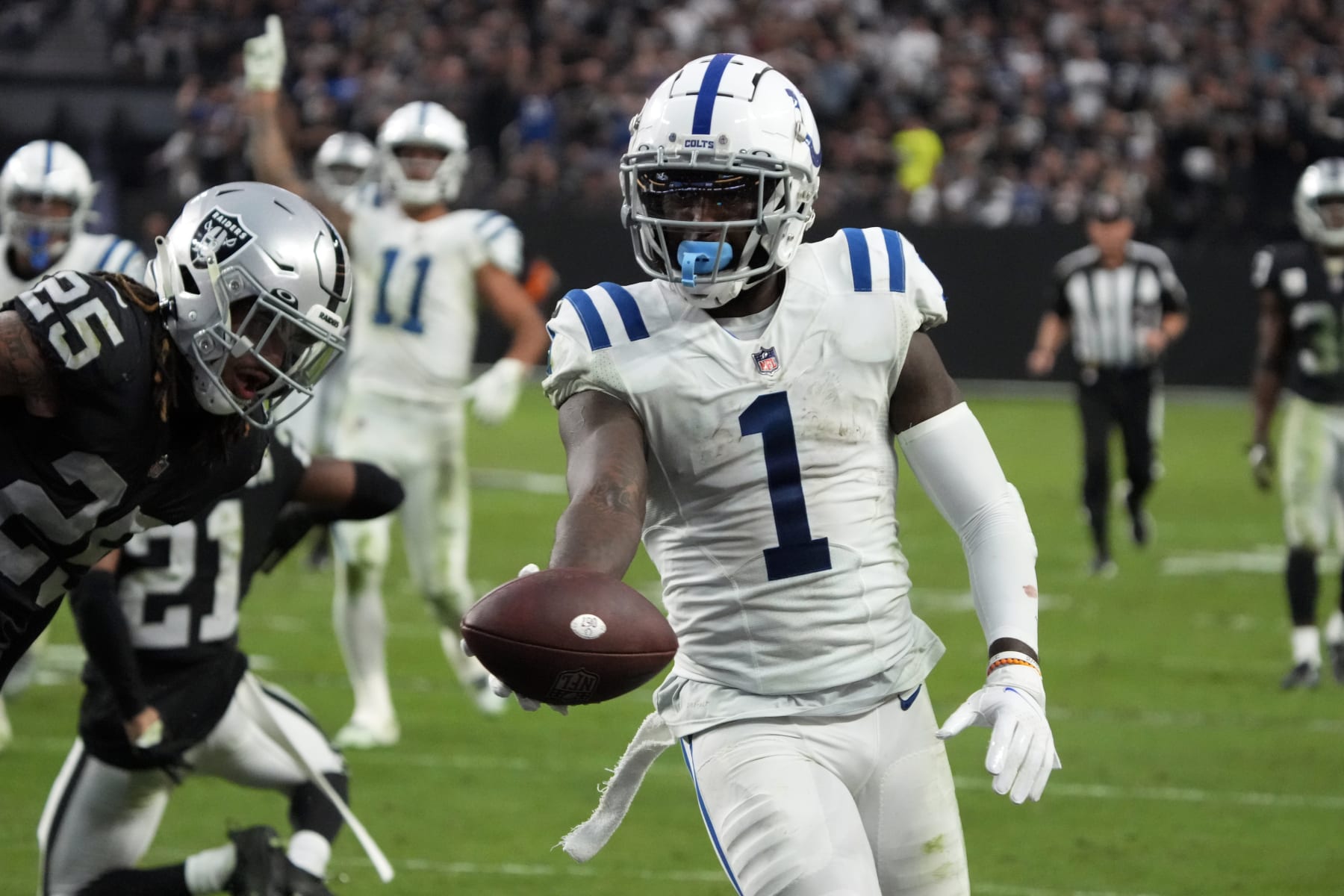 Indianapolis Colts wide receiver Parris Campbell (1) scores a touchdown against the Las Vegas Raiders during the first half of an NFL football game, Sunday, Nov 13, 2022, in Las Vegas. (AP Photo/Rick Scuteri)