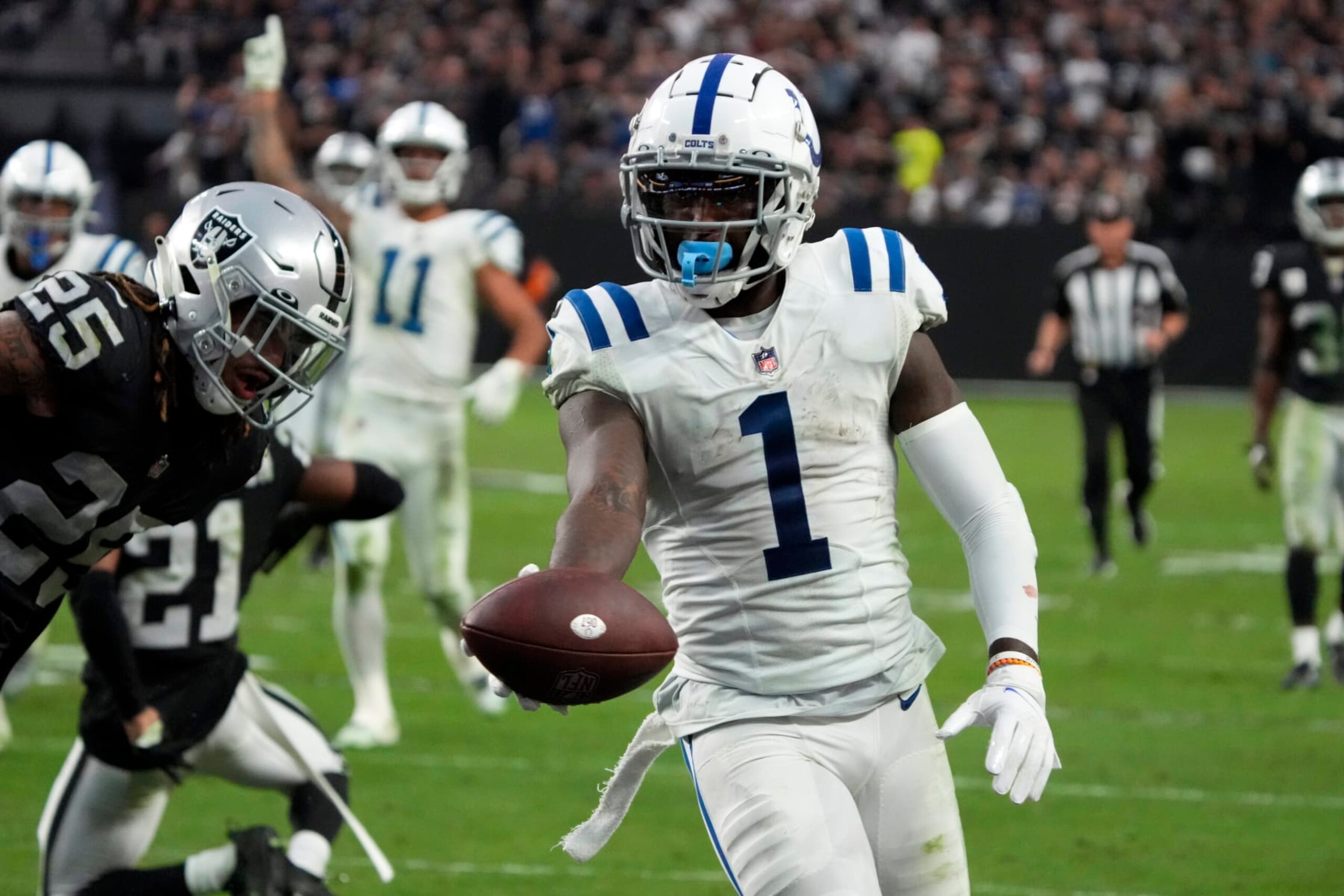 Indianapolis Colts wide receiver Parris Campbell (1) scores a touchdown against the Las Vegas Raiders during the first half of an NFL football game, Sunday, Nov 13, 2022, in Las Vegas. (AP Photo/Rick Scuteri)