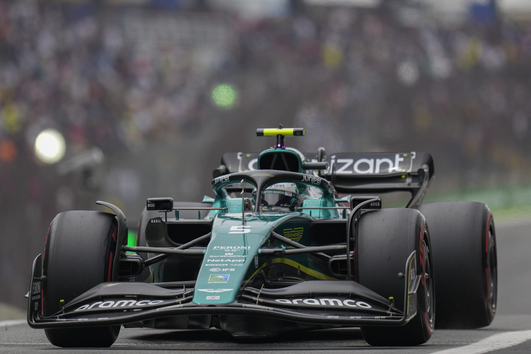 Aston Martin driver Sebastian Vettel, of Germany, steers his car along the pit lane during a free practice ahead of Brazil Formula One Grand Prix at Interlagos race track in Sao Paulo, Brazil, Friday, Nov. 11, 2022. (AP Photo/Andre Penner)