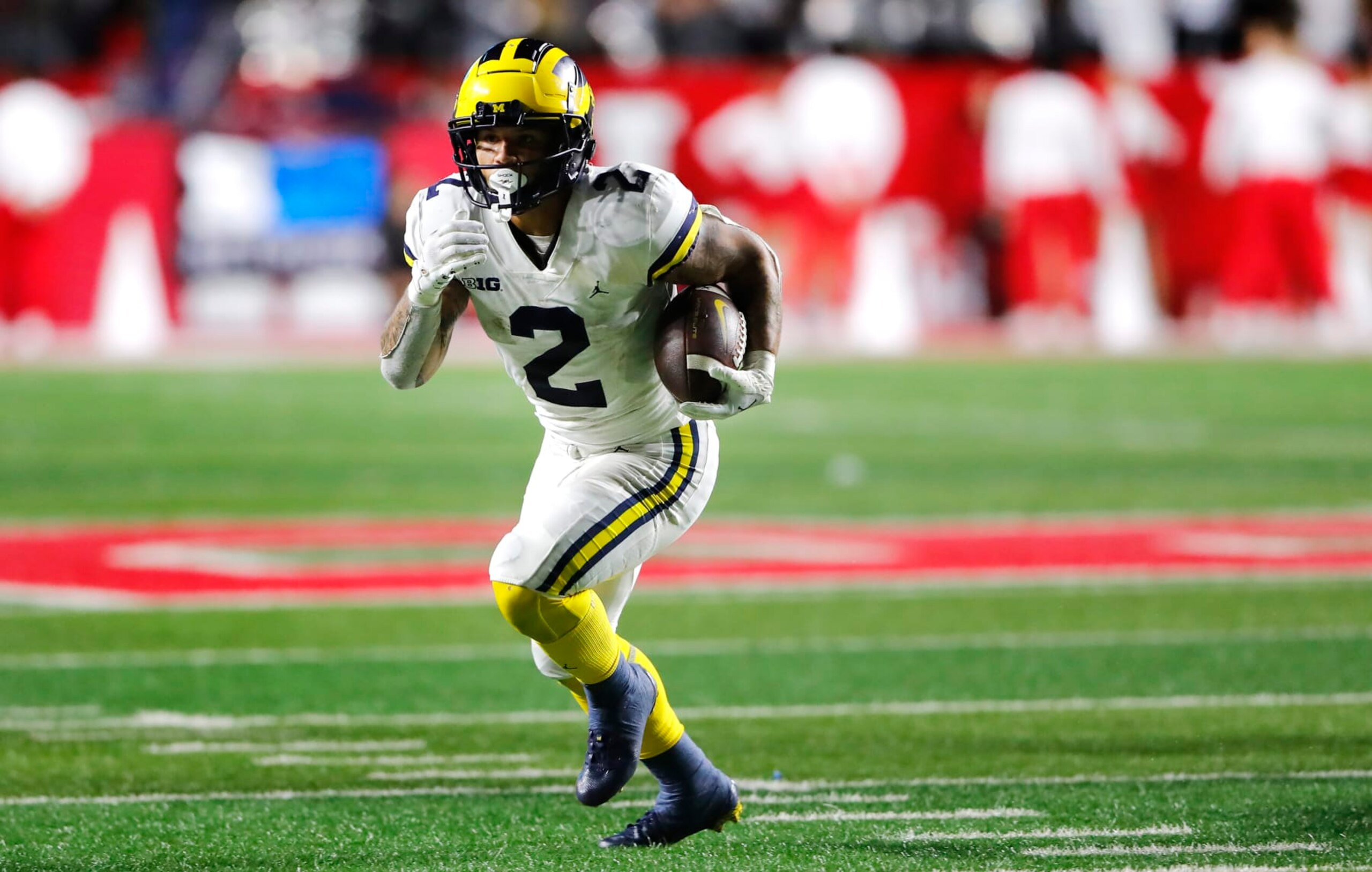 Michigan running back Blake Corum (2) rushes against Rutgers during the second half of an NCAA football game, Saturday, Nov. 5, 2022 in Piscataway, N.J. (AP Photo/Noah K. Murray)