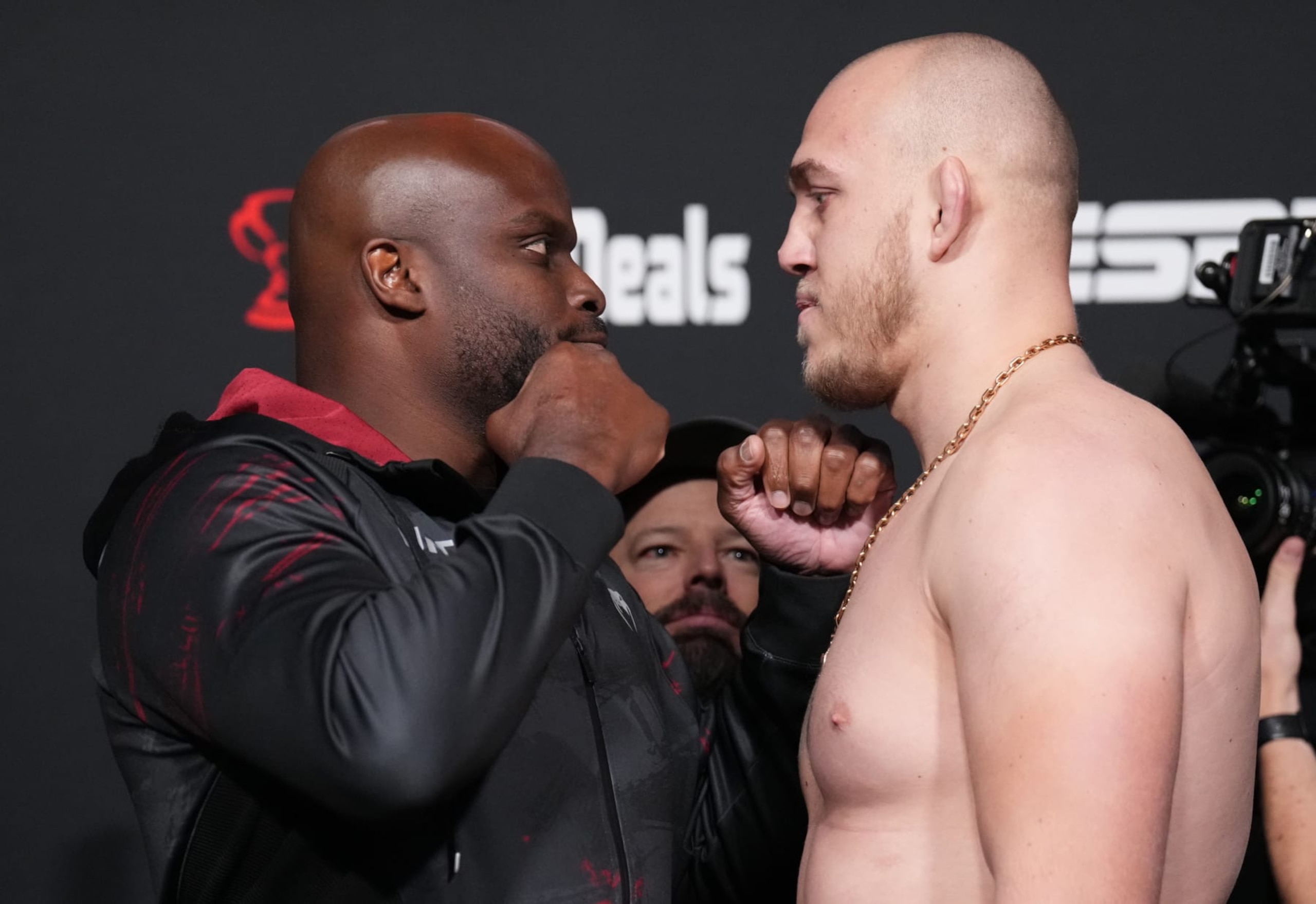 LAS VEGAS, NEVADA - NOVEMBER 18: (L-R) Opponents Derrick Lewis and Serghei Spivac of Moldova face off during the UFC Fight Night weigh-in at UFC APEX on November 18, 2022 in Las Vegas, Nevada. (Photo by Chris Unger/Zuffa LLC)