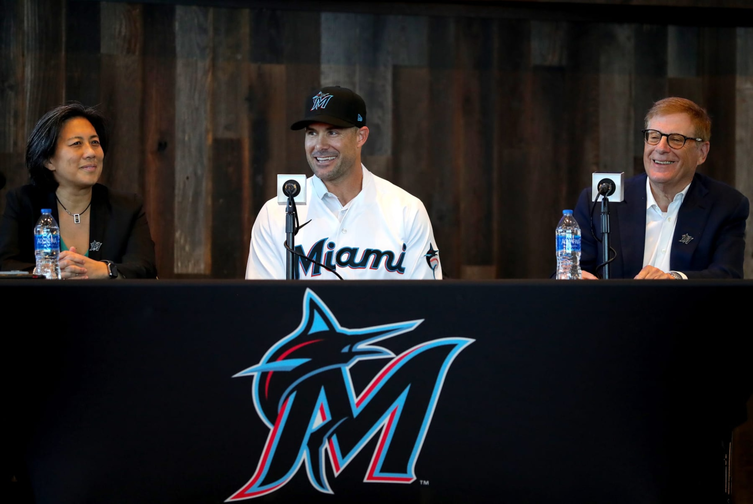 MIAMI, FLORIDA - NOVEMBER 03: General manager Kim Ng, manager Skip Schumaker, and owner Bruce Sherman of the Miami Marlins speak to the media during a press conference at loanDepot park on November 03, 2022 in Miami, Florida. (Photo by Megan Briggs/Getty Images)