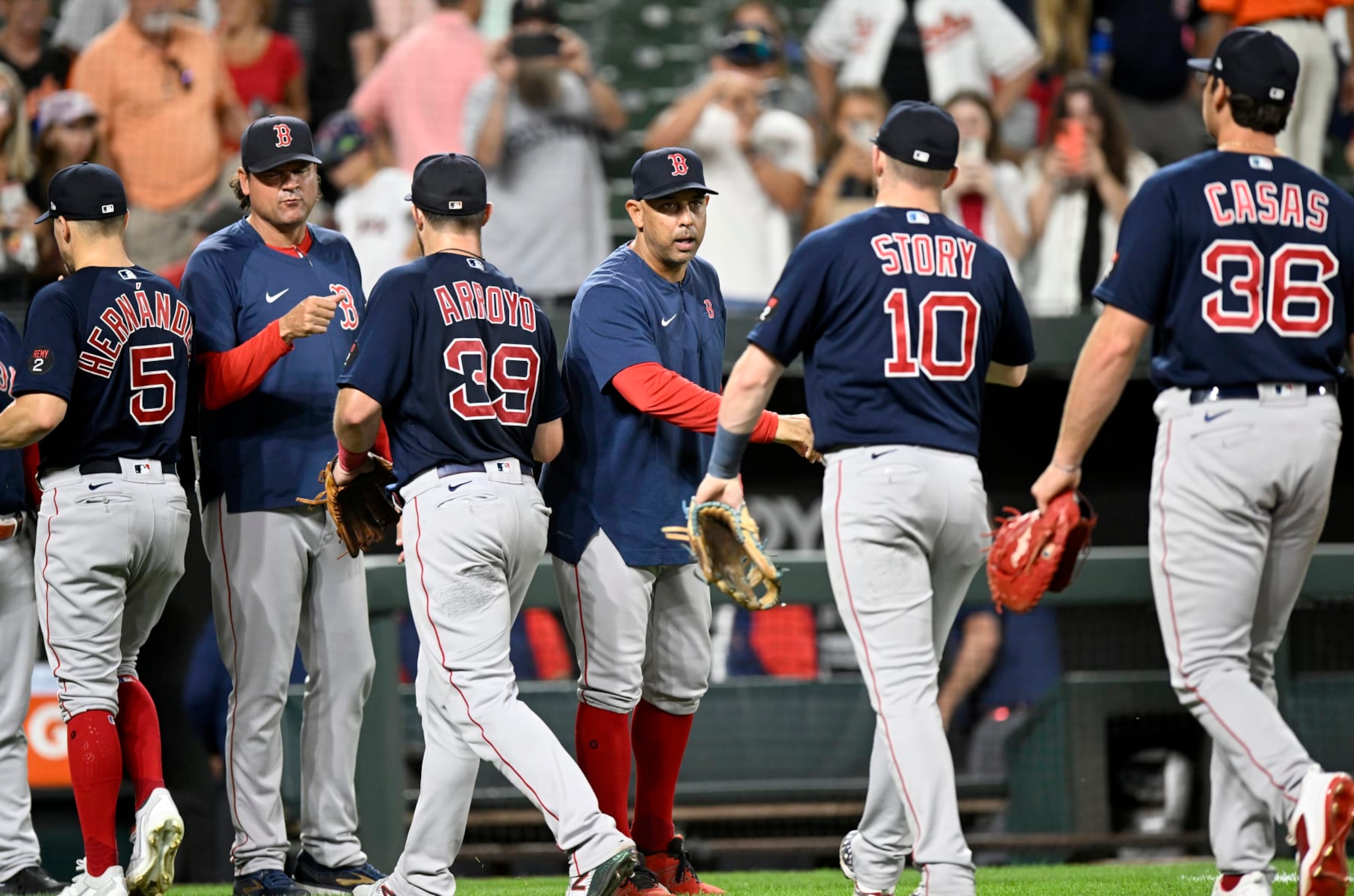BALTIMORE, MARYLAND - SEPTEMBER 10: Manager Alex Cora #13 of the Boston Red Sox celebrates with his team after a 17-4 victory against the Baltimore Orioles at Oriole Park at Camden Yards on September 10, 2022 in Baltimore, Maryland. (Photo by Greg Fiume/Getty Images)