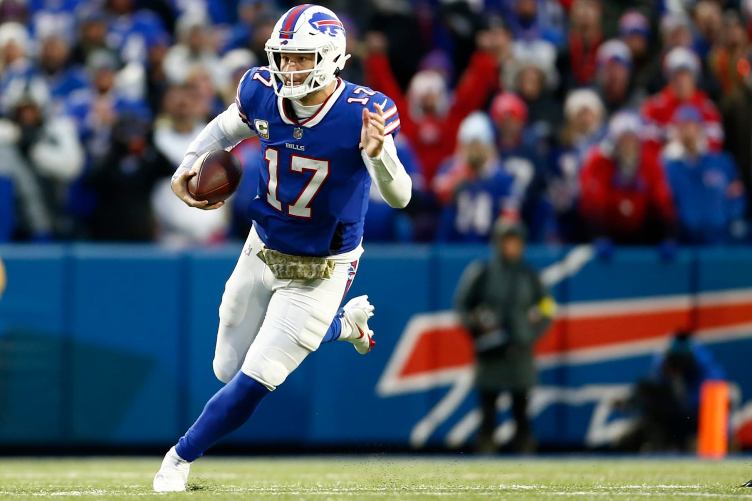ORCHARD PARK, NEW YORK - NOVEMBER 13: Josh Allen #17 of the Buffalo Bills runs during overtime against the Minnesota Vikings at Highmark Stadium on November 13, 2022 in Orchard Park, New York. (Photo by Isaiah Vazquez/Getty Images)