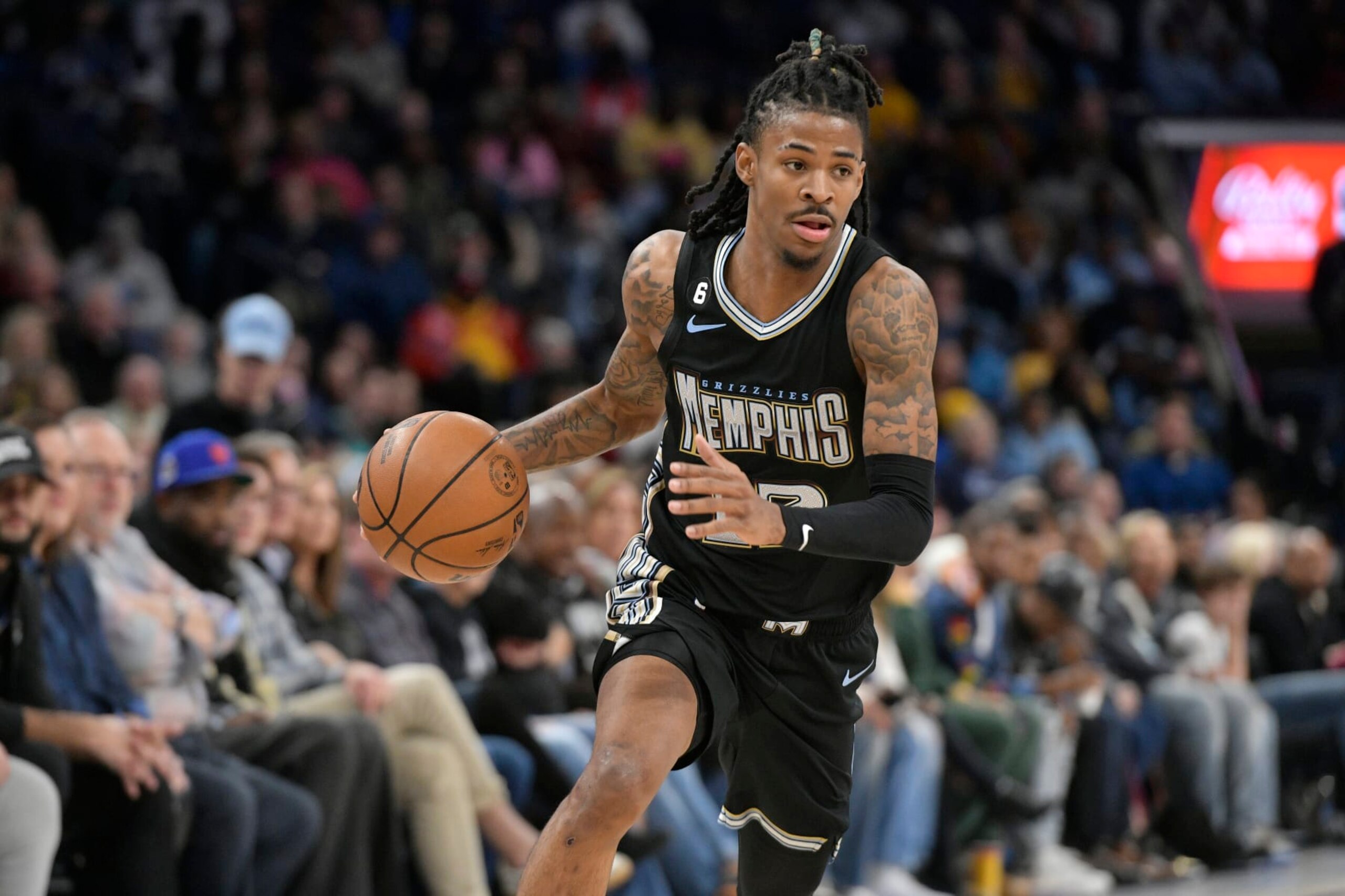 Memphis Grizzlies guard Ja Morant (12) handles the ball in the first half of an NBA basketball game against the Oklahoma City Thunder Friday, Nov. 18, 2022, in Memphis, Tenn. (AP Photo/Brandon Dill) Memphis Grizzlies guard Ja Morant (12) handles the ball in the first half of an NBA basketball game against the Oklahoma City Thunder Friday, Nov. 18, 2022, in Memphis, Tenn. (AP Photo/Brandon Dill)