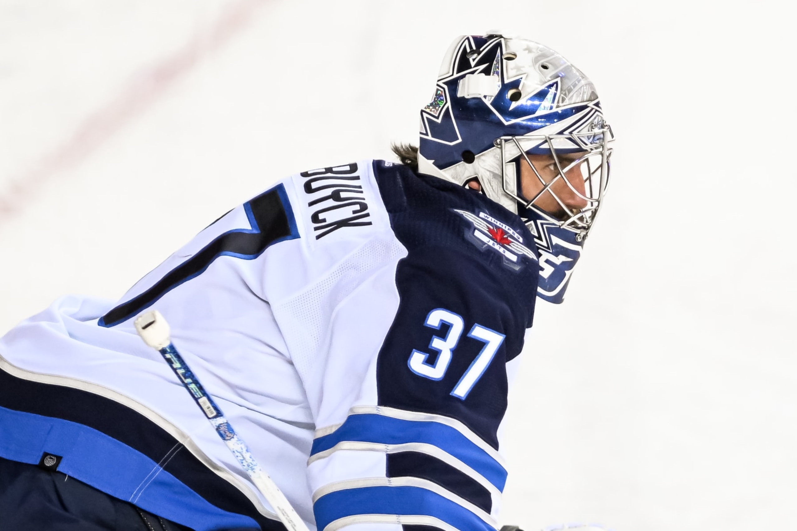 CALGARY, AB - NOVEMBER 12: Winnipeg Jets Goalie Connor Hellebuyck (37) warms up before an NHL game between the Calgary Flames and the Winnipeg Jets on November 12, 2022, at the Scotiabank Saddledome in Calgary, AB. (Photo by Brett Holmes/Icon Sportswire via Getty Images)
