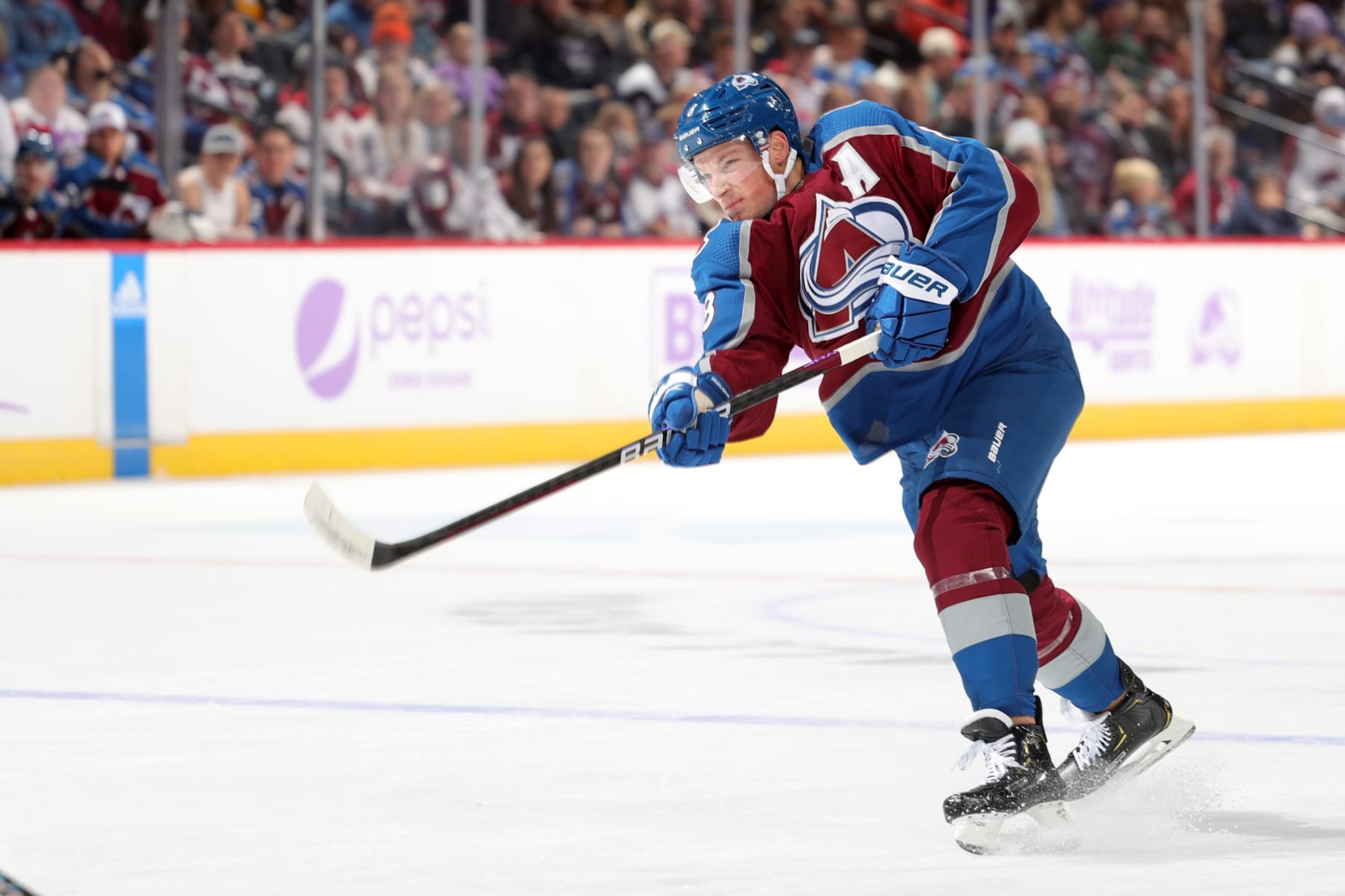 DENVER, COLORADO - NOVEMBER 12: Cale Makar #8 of the Colorado Avalanche shoots against the Carolina Hurricanes at Ball Arena on November 12, 2022 in Denver, Colorado. (Photo by Michael Martin/NHLI via Getty Images)