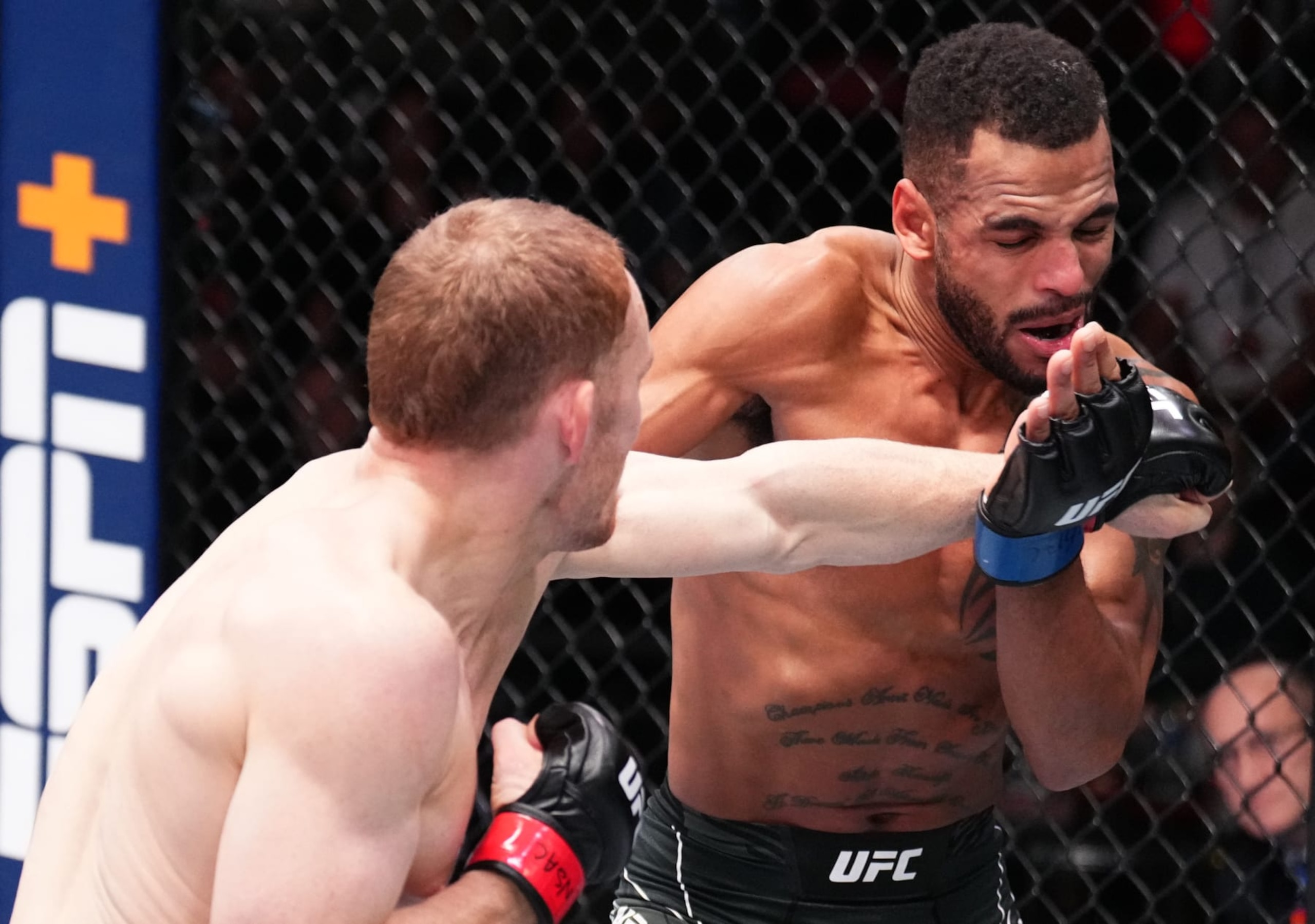 LAS VEGAS, NEVADA - NOVEMBER 19: (L-R) Jack Della Maddalena of Australia punches Danny Roberts of England in a welterweight fight during the UFC Fight Night event at UFC APEX on November 19, 2022 in Las Vegas, Nevada. (Photo by Chris Unger/Zuffa LLC)