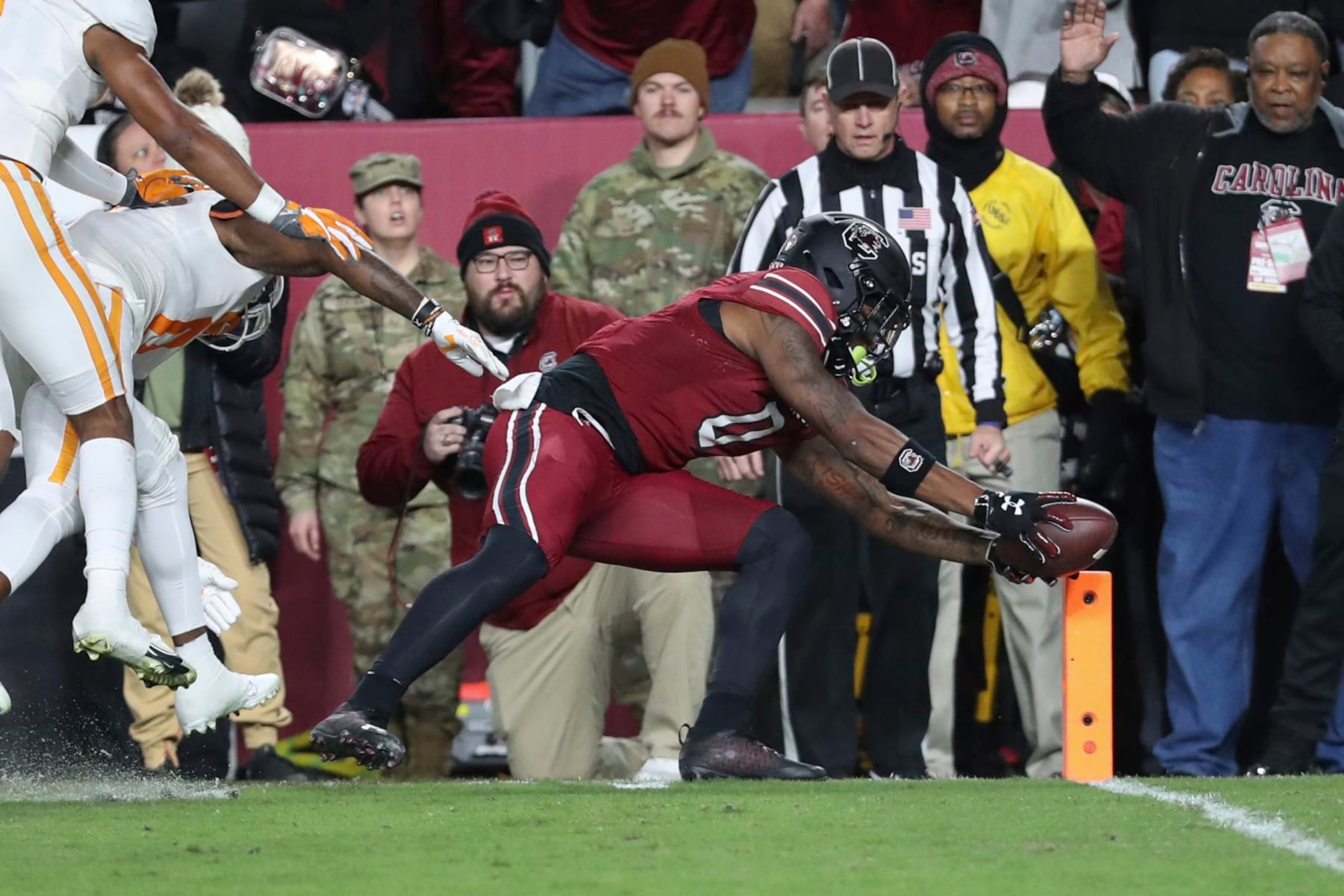 South Carolina tight end Jaheim Bell (0) dives for the end zone to score on a 19-yard reception during the first half of the team's NCAA college football game against Tennessee on Saturday, Nov. 19, 2022, in Columbia, S.C. (AP Photo/Artie Walker Jr.) South Carolina tight end Jaheim Bell (0) dives for the end zone to score on a 19-yard reception during the first half of the team's NCAA college football game against Tennessee on Saturday, Nov. 19, 2022, in Columbia, S.C. (AP Photo/Artie Walker Jr.)