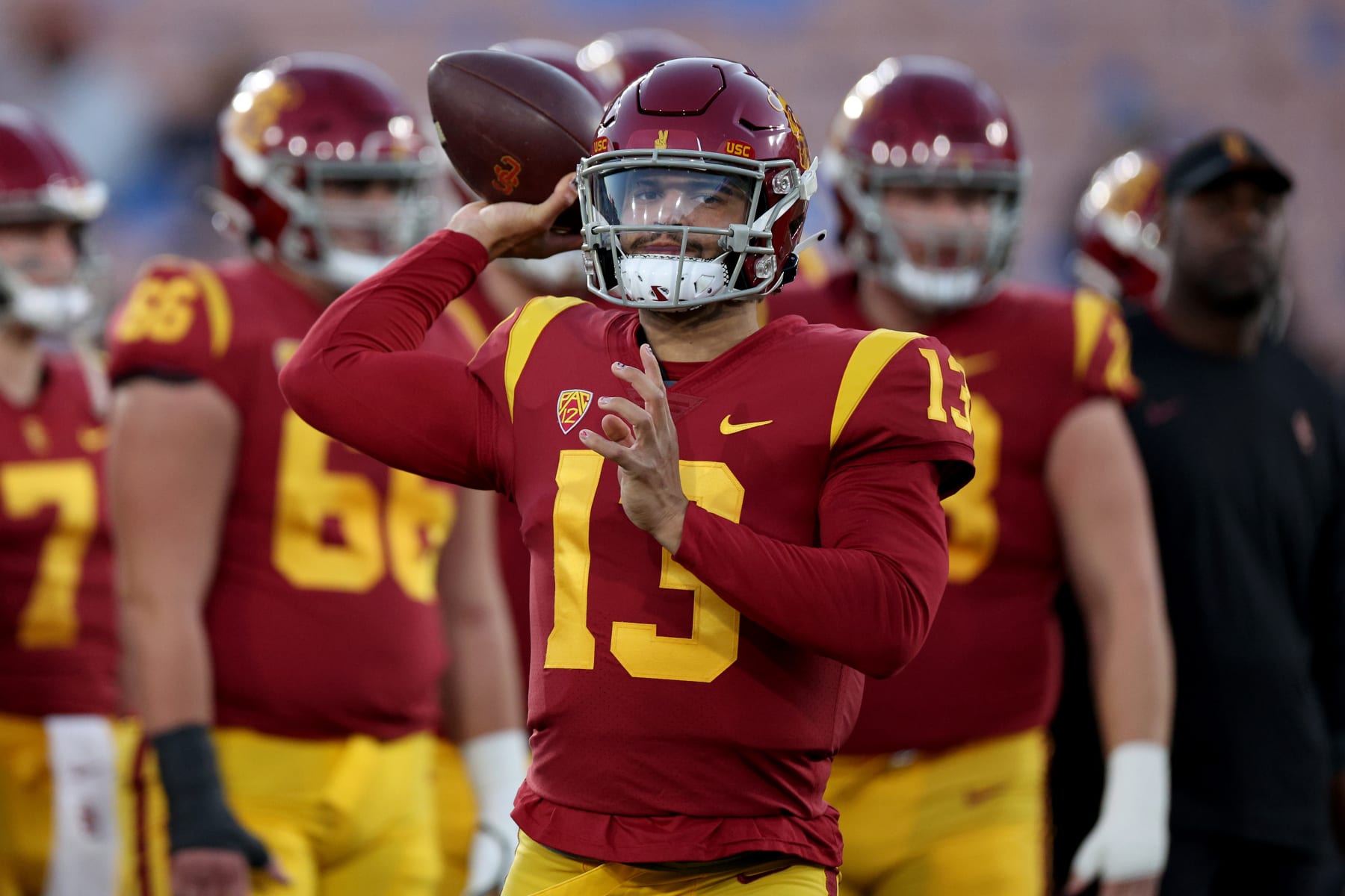 PASADENA, CALIFORNIA - NOVEMBER 19: Caleb Williams #13 of the USC Trojans warms up prior to the game against the UCLA Bruins at Rose Bowl on November 19, 2022 in Pasadena, California. (Photo by Harry How/Getty Images)