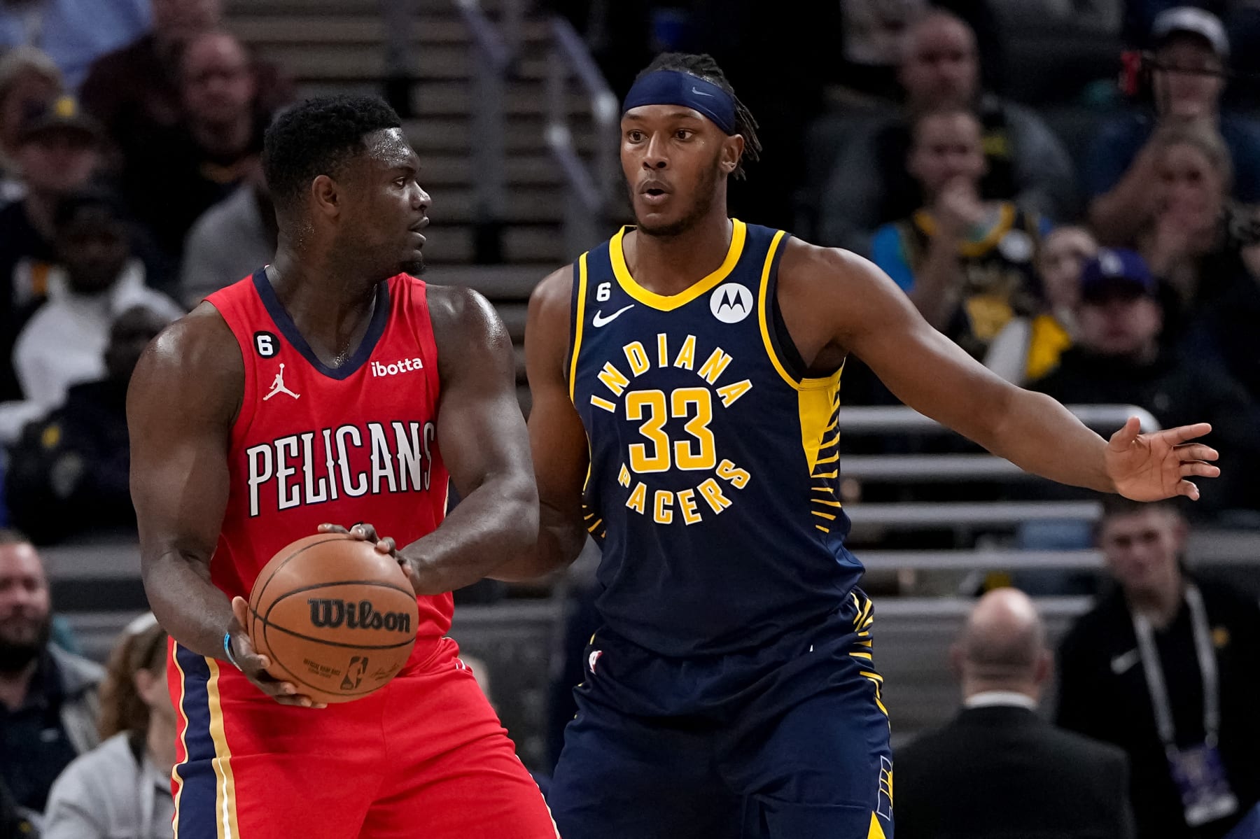 INDIANAPOLIS, INDIANA - NOVEMBER 07: Zion Williamson #1 of the New Orleans Pelicans handles the ball while being guarded by Myles Turner #33 of the Indiana Pacers in the first quarter at Gainbridge Fieldhouse on November 07, 2022 in Indianapolis, Indiana. NOTE TO USER: User expressly acknowledges and agrees that, by downloading and or using this photograph, User is consenting to the terms and conditions of the Getty Images License Agreement. (Photo by Dylan Buell/Getty Images)