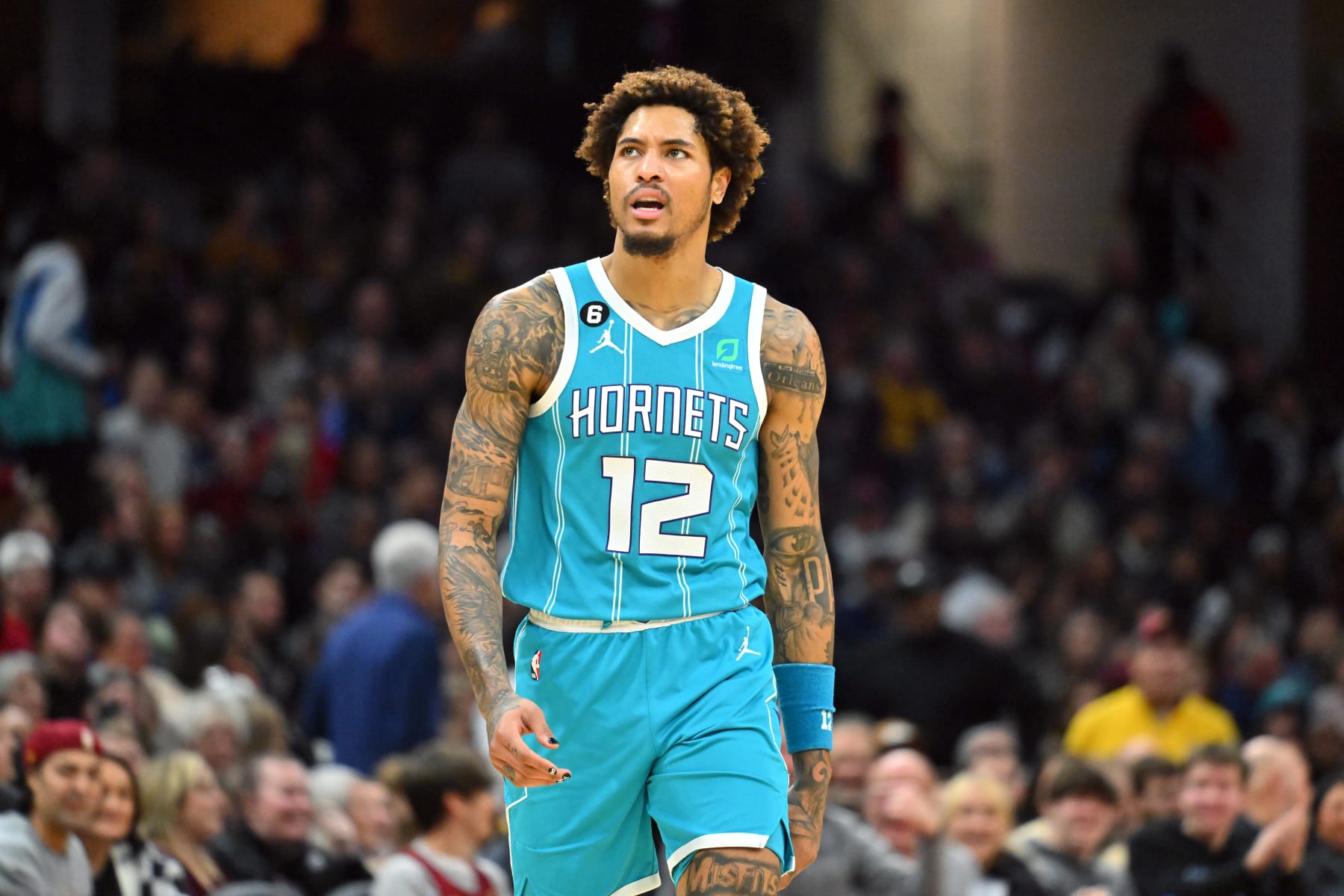 CLEVELAND, OHIO - NOVEMBER 18: Kelly Oubre Jr. #12 of the Charlotte Hornets reacts during the second half against the Cleveland Cavaliers at Rocket Mortgage Fieldhouse on November 18, 2022 in Cleveland, Ohio. The Cavaliers defeated the Hornets 132-122 in double overtime. NOTE TO USER: User expressly acknowledges and agrees that, by downloading and or using this photograph, User is consenting to the terms and conditions of the Getty Images License Agreement. (Photo by Jason Miller/Getty Images)