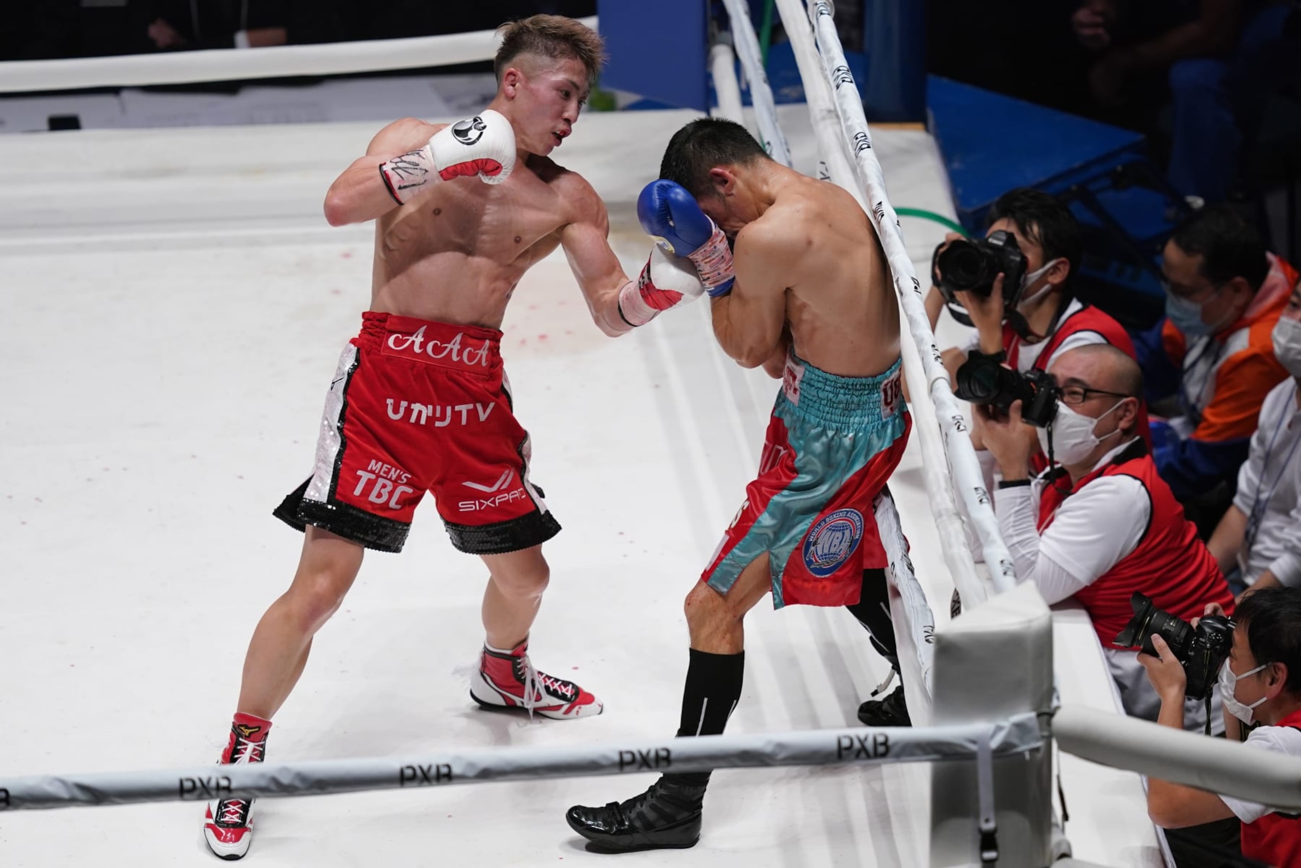 TOKYO, JAPAN - DECEMBER 14: Naoya Inoue (L) of Japan punches Aran Dipaen of Thailand during the WBA Super Bantamweight and IBO Bantamweight title bout at Ryogoku Kokugikan on December 14, 2021 in Tokyo, Japan. (Photo by Toru Hanai/Getty Images) TOKYO, JAPAN - DECEMBER 14: Naoya Inoue (L) of Japan punches Aran Dipaen of Thailand during the WBA Super Bantamweight and IBO Bantamweight title bout at Ryogoku Kokugikan on December 14, 2021 in Tokyo, Japan. (Photo by Toru Hanai/Getty Images)