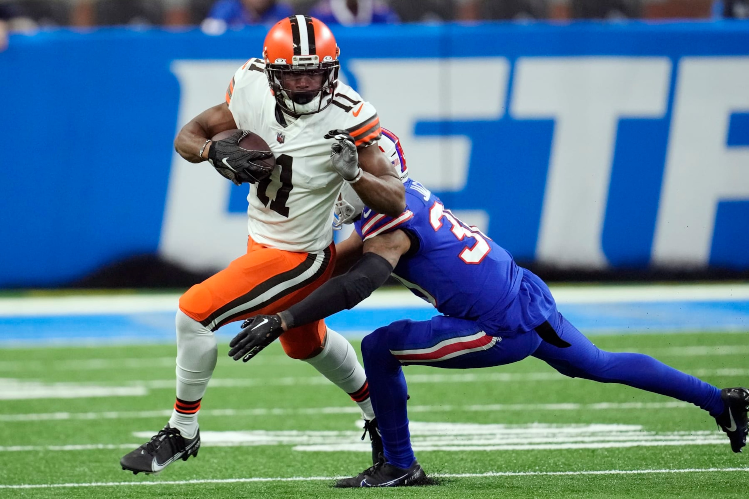 Cleveland Browns wide receiver Donovan Peoples-Jones (11) pulls away from Buffalo Bills cornerback Dane Jackson (30) during the first half of an NFL football game, Sunday, Nov. 20, 2022, in Detroit. (AP Photo/Paul Sancya) Cleveland Browns wide receiver Donovan Peoples-Jones (11) pulls away from Buffalo Bills cornerback Dane Jackson (30) during the first half of an NFL football game, Sunday, Nov. 20, 2022, in Detroit. (AP Photo/Paul Sancya)