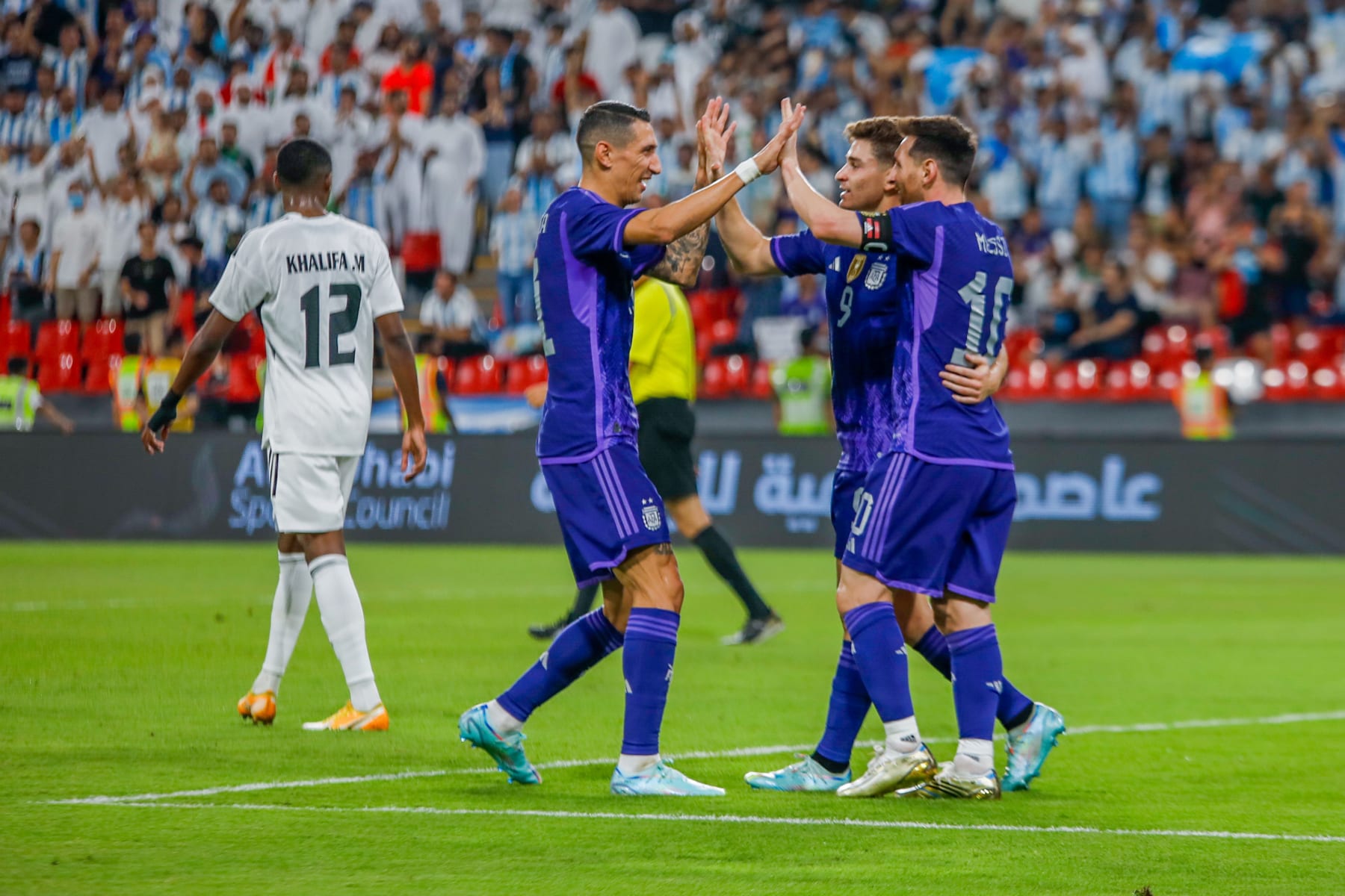 ABU DHABI, UNITED ARAB EMIRATES - NOVEMBER 16: Lionel Messi of Argentina celebrates his goal with team mates during a friendly match between UAE and Argentina ahead of FIFA 2022 World Cup at Mohammed bin Zayed Stadium in Abu Dhabi, United Arab Emirates on November 16, 2022. (Photo by Waleed Zein/Anadolu Agency via Getty Images)