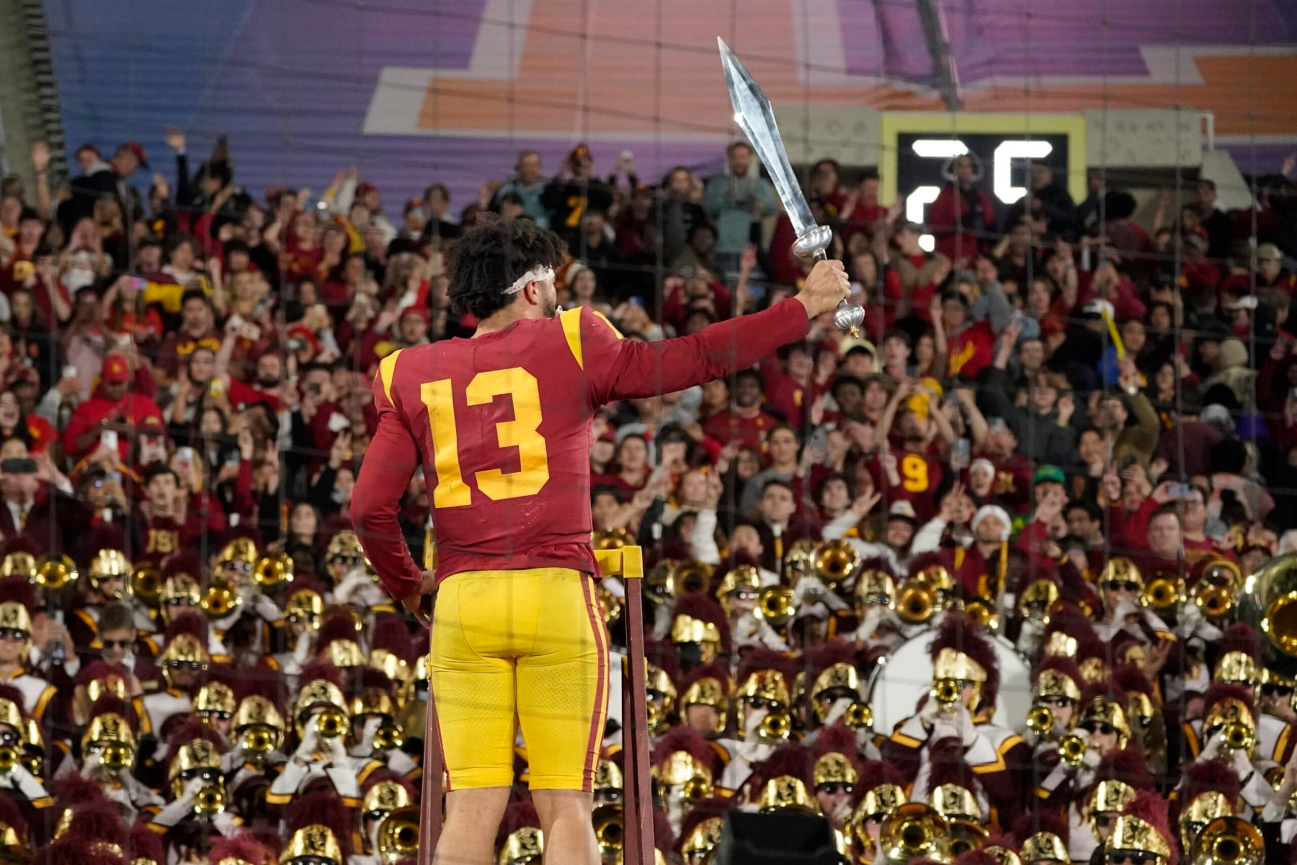 Southern California quarterback Caleb Williams leads the USC Marching Band after USC defeat UCLA 48-45 in an NCAA college football game Saturday, Nov. 19, 2022, in Pasadena, Calif. (AP Photo/Mark J. Terrill)